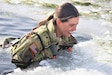 A student in Cold-Weather Operations Course (CWOC) class 22-03 participates in cold-water immersion training Jan. 31, 2022, at Big Sandy Lake on South Post at Fort McCoy, Wis. The training event is the final training event before graduating from the CWOC. CWOC students are trained on a variety of cold-weather subjects, including snowshoe training and skiing as well as how to use other gear. Training also focuses on terrain and weather analysis, risk management, cold-weather clothing, developing winter fighting positions in the field, camouflage and concealment, and numerous other areas that are important to know in order to operate in a cold-weather environment. The training is coordinated through the Directorate of Plans, Training, Mobilization and Security at Fort McCoy with support from contractor Veterans Range Solutions.
