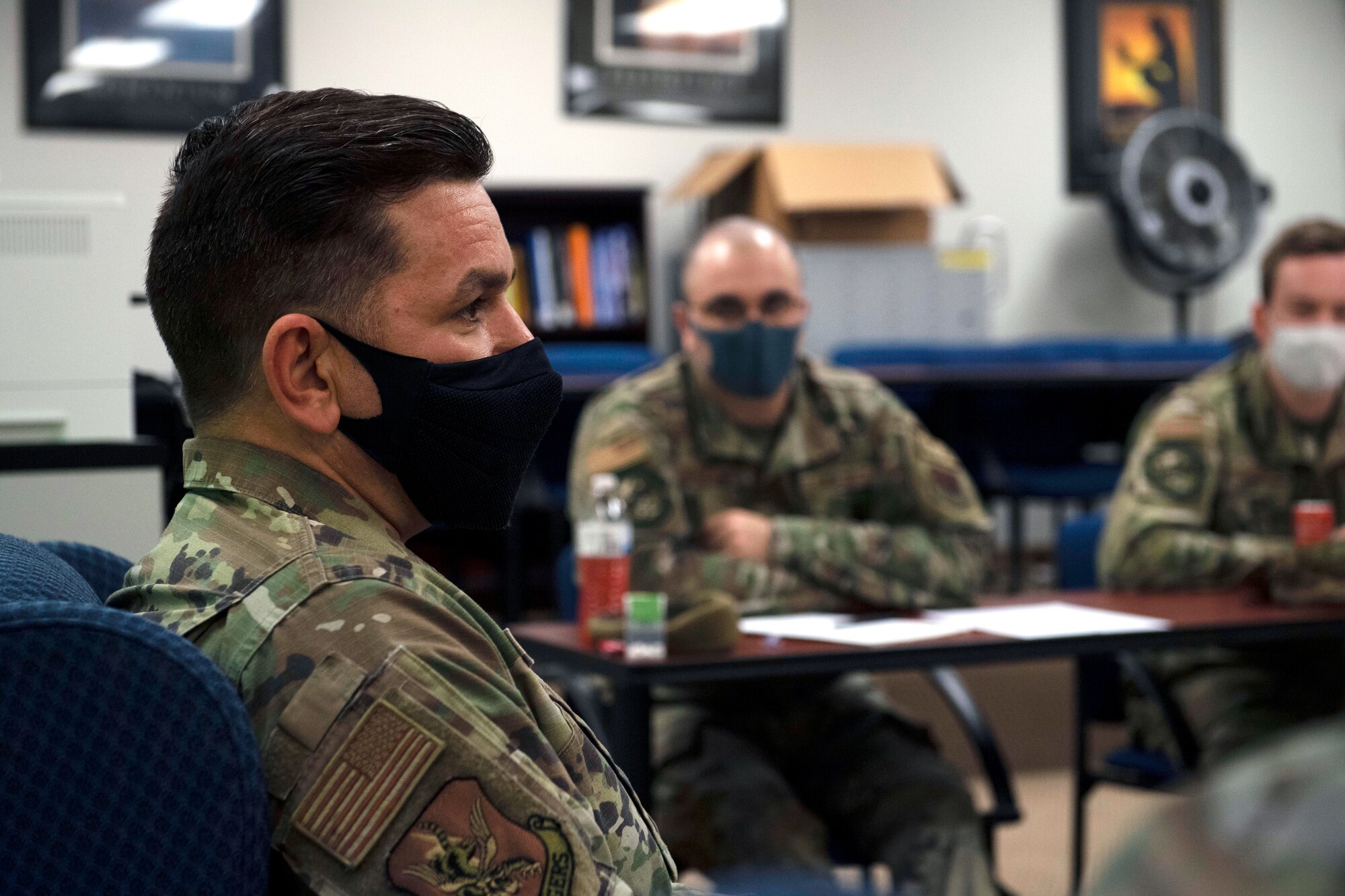 U.S. Air Force Chief Master Sgt. James Wilfong, 23rd Wing Command Chief, addresses Airmen at a Chief's Panel during a Flying Tigers University course at Moody Air Force Base, Georgia, January 28, 2022. The Chief's Panel gave Airmen the opportunity to ask senior leaders professional development and mentorship questions. (U.S. Air Force photo by Airman 1st Class Rachel Perkinson.)