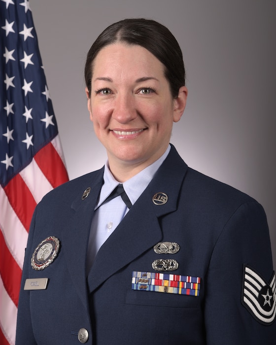 Tech. Sgt. Joline Powell, a recruiter assigned to the 115th Fighter Wing, poses for an official photo Jan. 20, 2022. (U.S. Air National Guard photo by Senior Master Sgt. Paul Gorman)