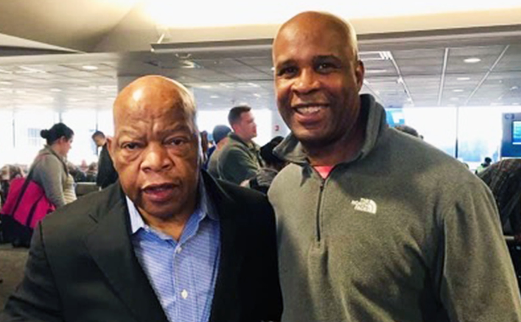 Head and shoulders shot of two black men.