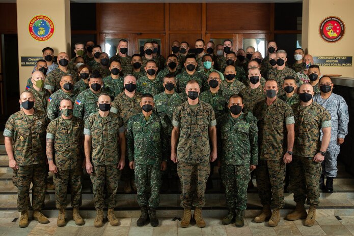 U.S. Marine Corps Forces, Pacific Staff Talks (MARFORPAC-PMC Staff Talks) pose for a group photo at the conclusion of the talks on Camp H. M. Smith, Hawaii, Feb. 10, 2022. The MARFORPAC-PMC Staff Talks serve to strengthen the relationship between MARFORPAC and the Philippine Marine Corps by providing the opportunity to align goals and objectives and collaborate on common interests through bilateral discussions and engagements.