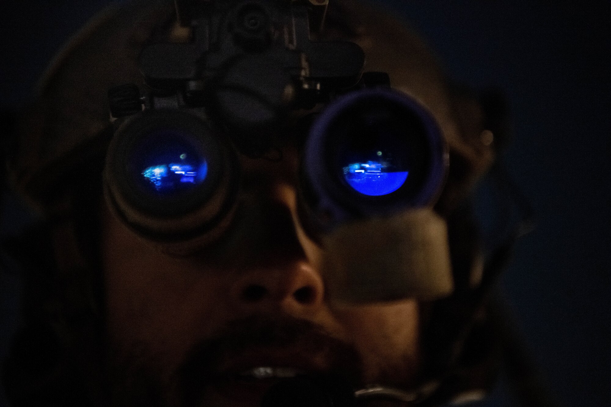 man in night vision goggles