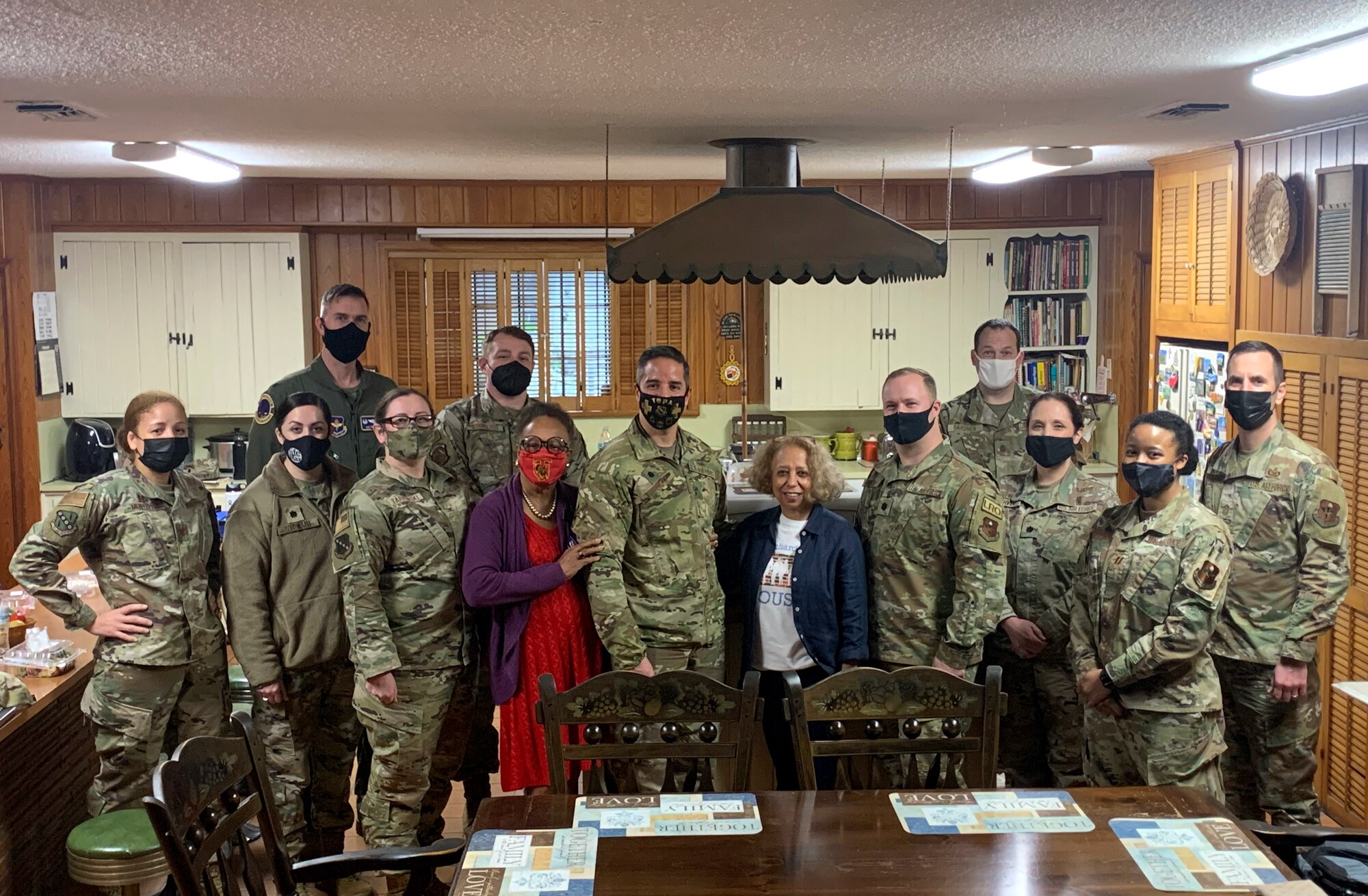 Maxwell AFB leaders pose with Dr. Valda Montgomery Harris and Dr. Shirley Cherry during a tour of the Dr. Richard Harris House, Feb. 3, 2022. The House served as a meeting point for civil rights activists such as Martin Luther King Jr. and John Lewis. (U.S. Air Force photo by Senior Airman Rhonda Smith)