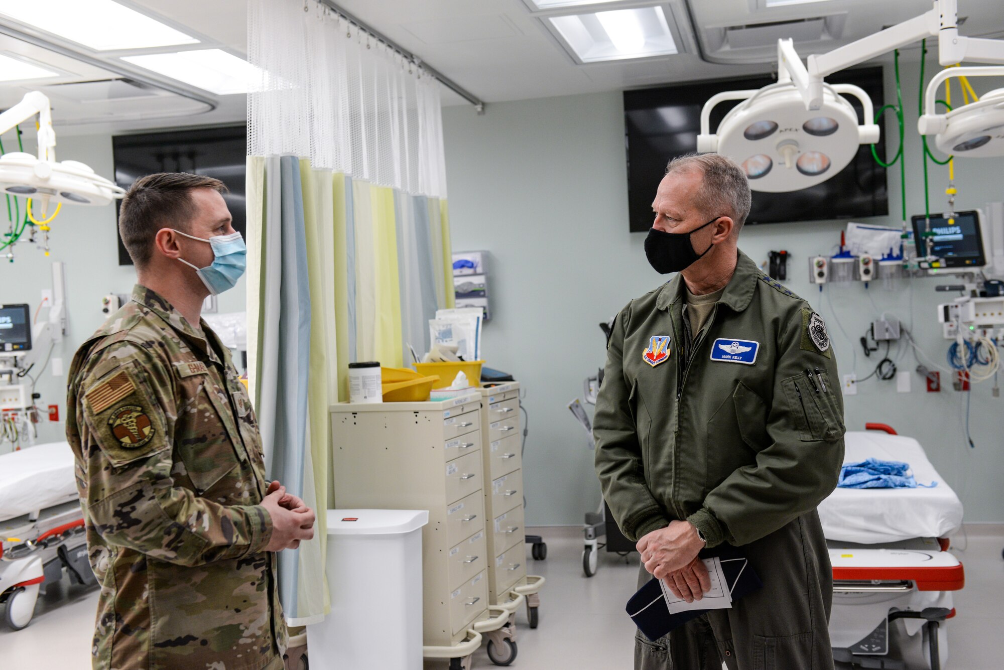 Airman briefs general in hospital room
