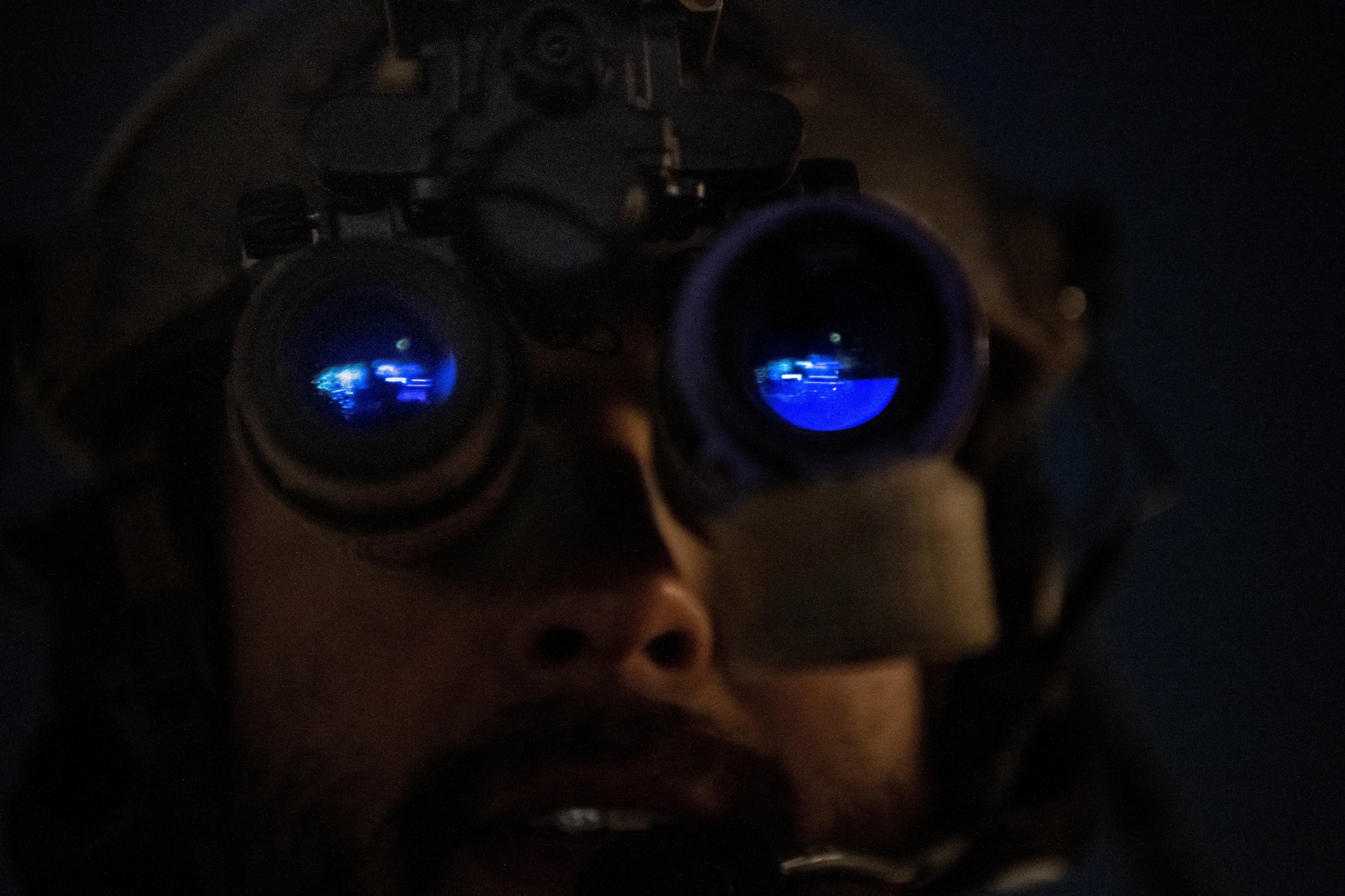 man in night vision goggles