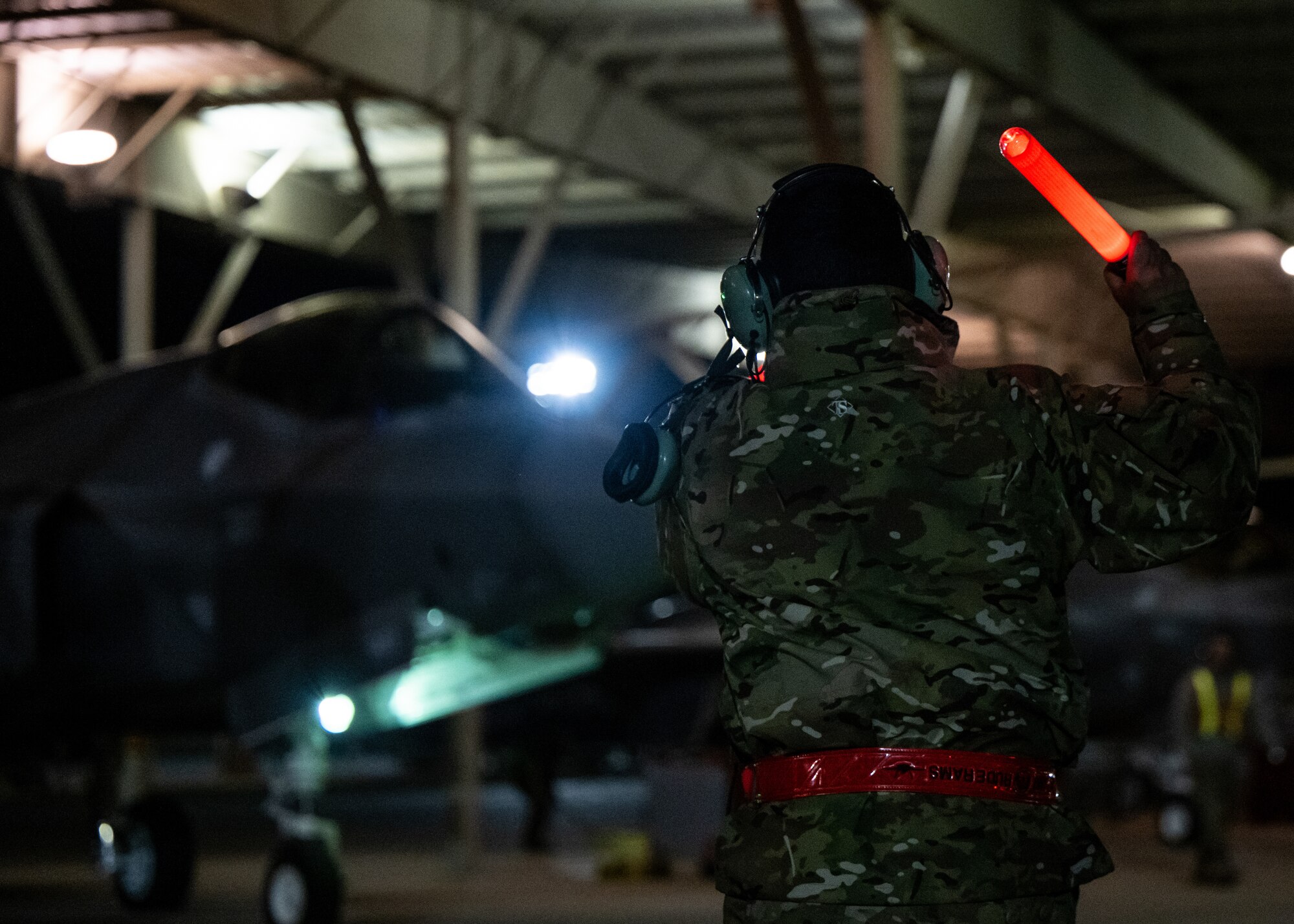 A photo of an F-35 crew preparing to deploy