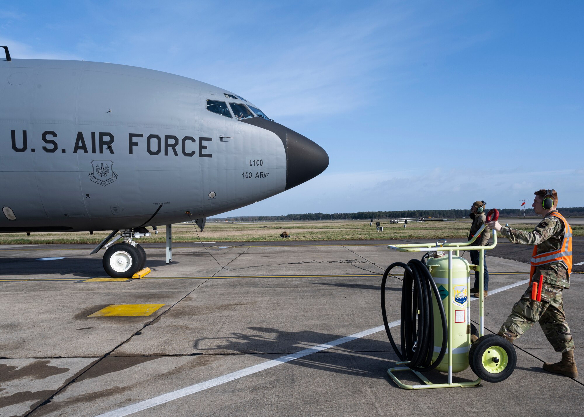 A U.S. Air Force Airmen assigned to the 100th Maintenance Squadron perform pre-flight checks on a KC-135 Stratotanker aircraft at Royal Air Force Mildenhall, England, Feb. 16, 2022. The 100th ARW is the only permanent U.S. air refueling wing in the European theater providing the critical air refueling "bridge" that enables the Expeditionary Air Force to deploy around the globe on a moment's notice.