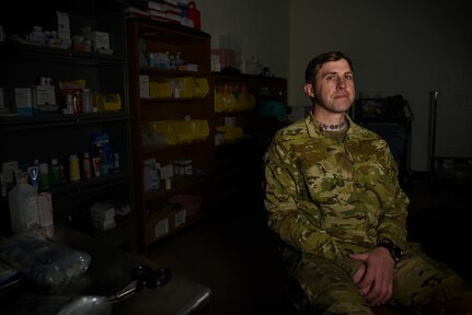 Staff Sgt. John Hampson, an instructor at the U.S. Army Mountain Warfare School, in the school aid station during the Basic Military Mountaineer Course Jan. 20, 2022. The AMWS is a U.S. Army Training and Doctrine Command school operated by the Vermont Army National Guard at Camp Ethan Allen Training Site, Vermont.