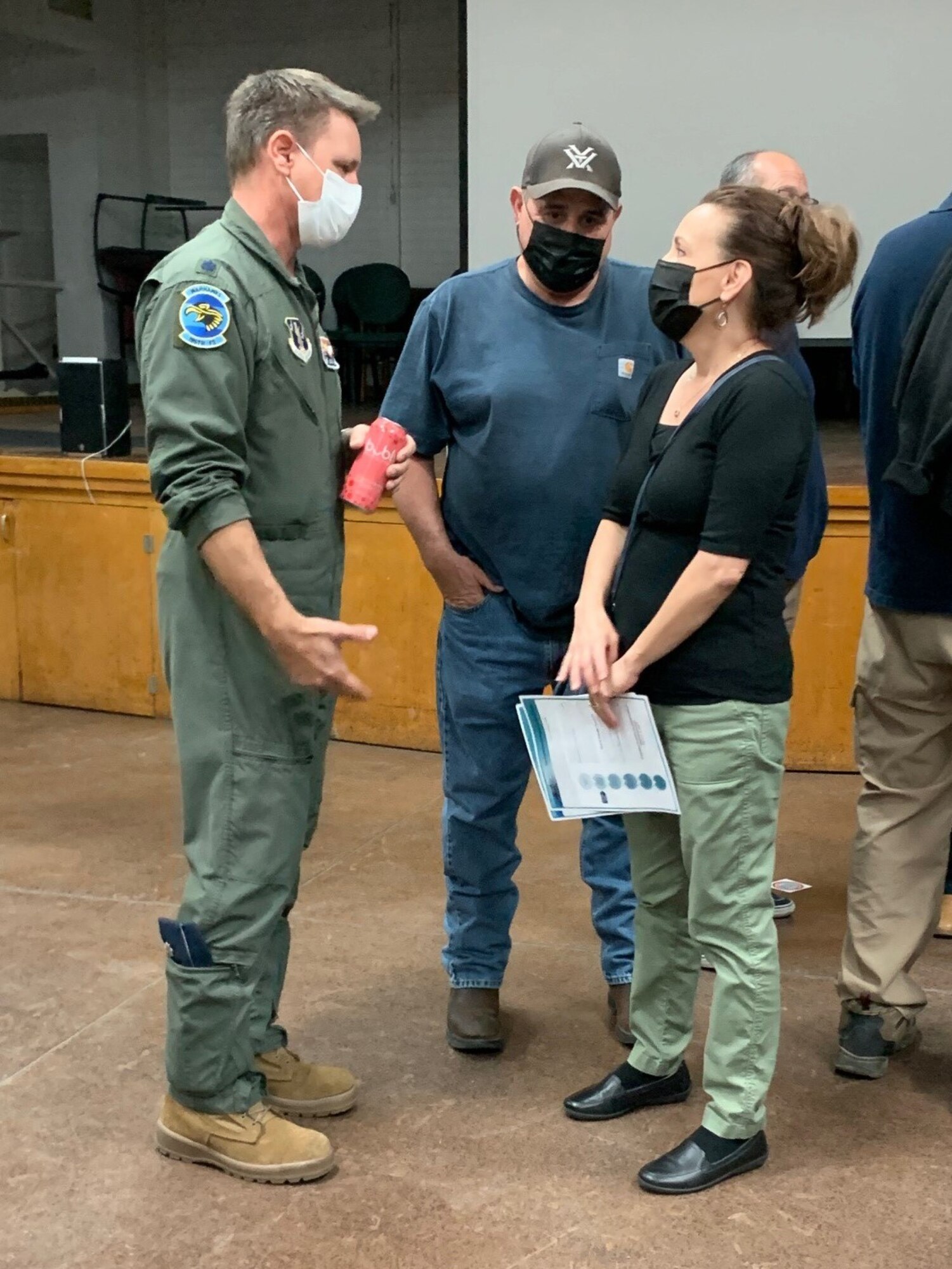 Lt. Col. Jason Lewis, an F-16 instructor pilot assigned to Morris ANGB, explains airspace considerations with members of the public during a recent scoping meeting for regional special use airspace optimization to support Air Force missions in Arizona.