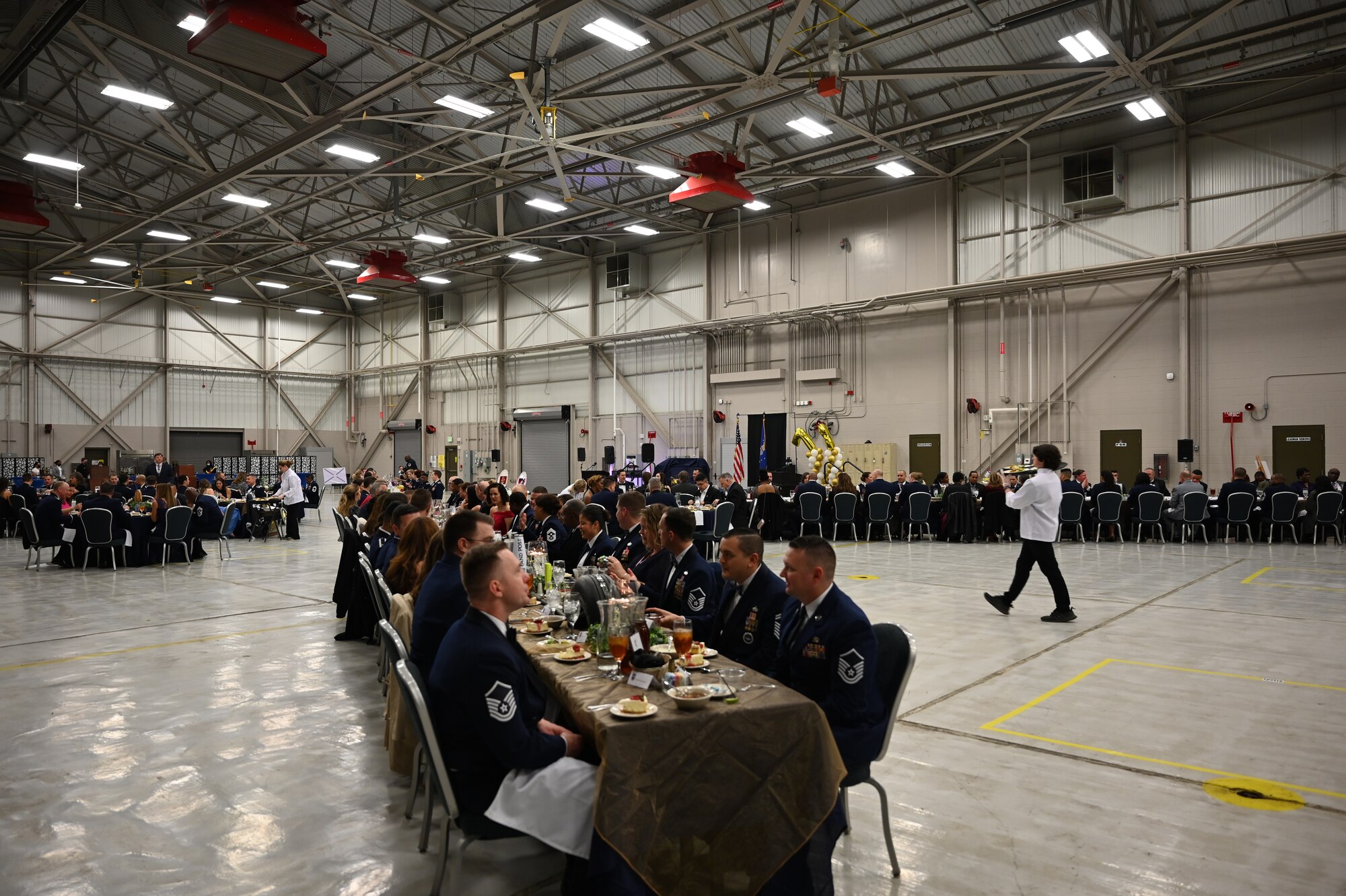 14th Flying Training Wing personnel and their guest attend the Annual Awards and Dining Out Ceremony, Feburary 12, 2022, on Columbus Air Force Base, Miss. Due to the event being a dining out, base personnel were able to invite guest who are not military service members. (U.S. Air Force Photo by Second Lieutenant Peyton Craven)