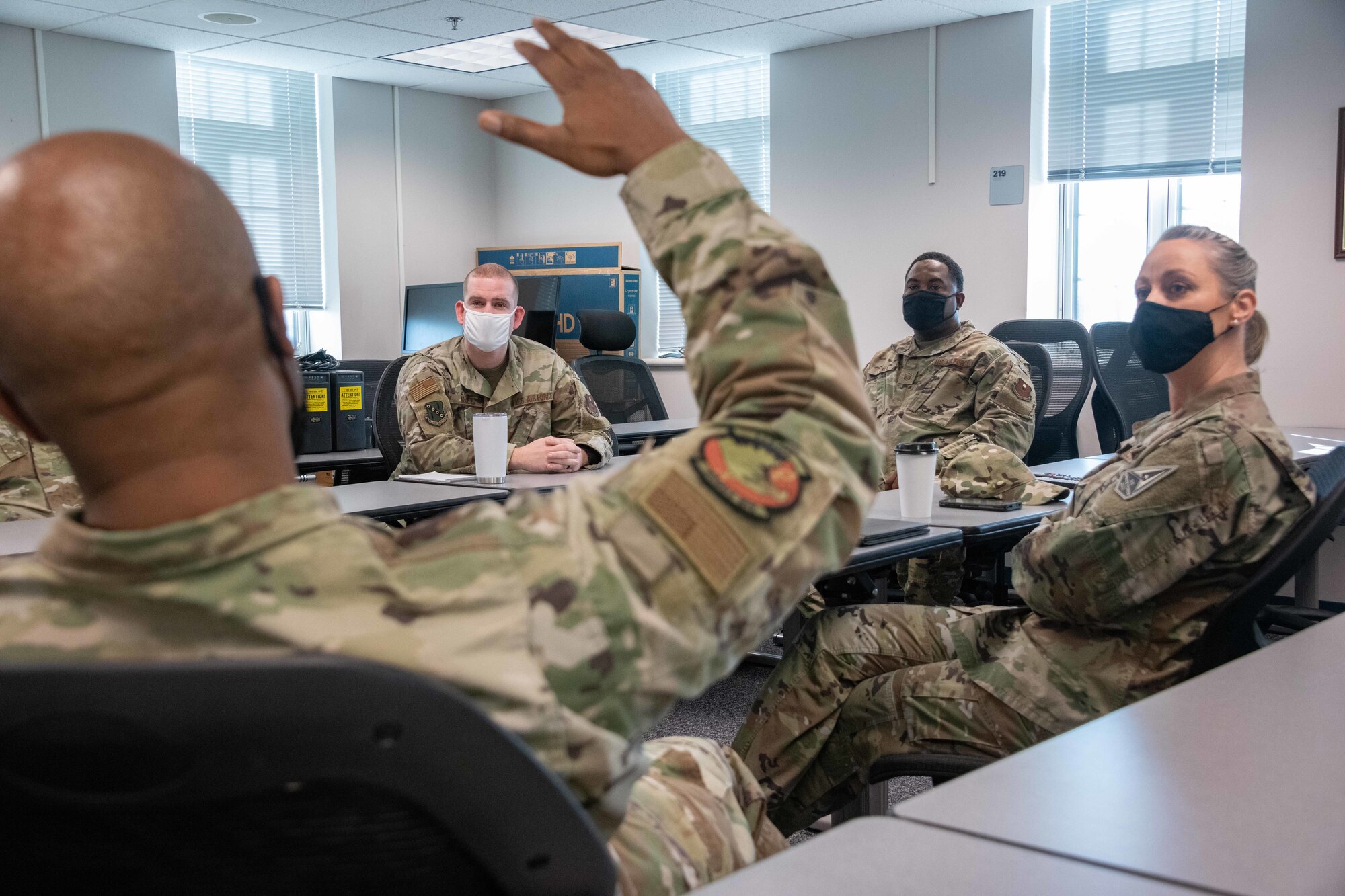 Air and Space Force personnel talk