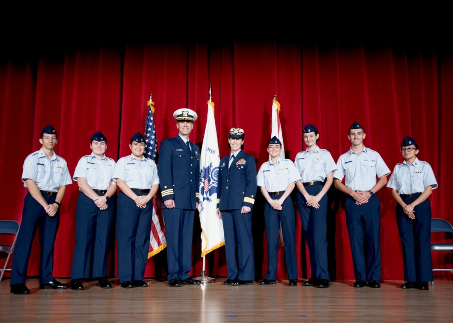 Coast Guard Rear Adm. Megan Dean, Cmdr. Clay Cromer, and high school student cadet leaders conduct the ceremony for the establishment of the Coast Guard Junior Reserve Officers' Training Corps (JROTC) unit at Pinellas Park High School in Largo, Florida, Nov. 12, 2021. The unit is the fourth and largest Coast Guard JROTC established, and the second unit established under recently-expanded federal law. U.S. Coast Guard photo by Petty Officer 1st Class Ayla Hudson.