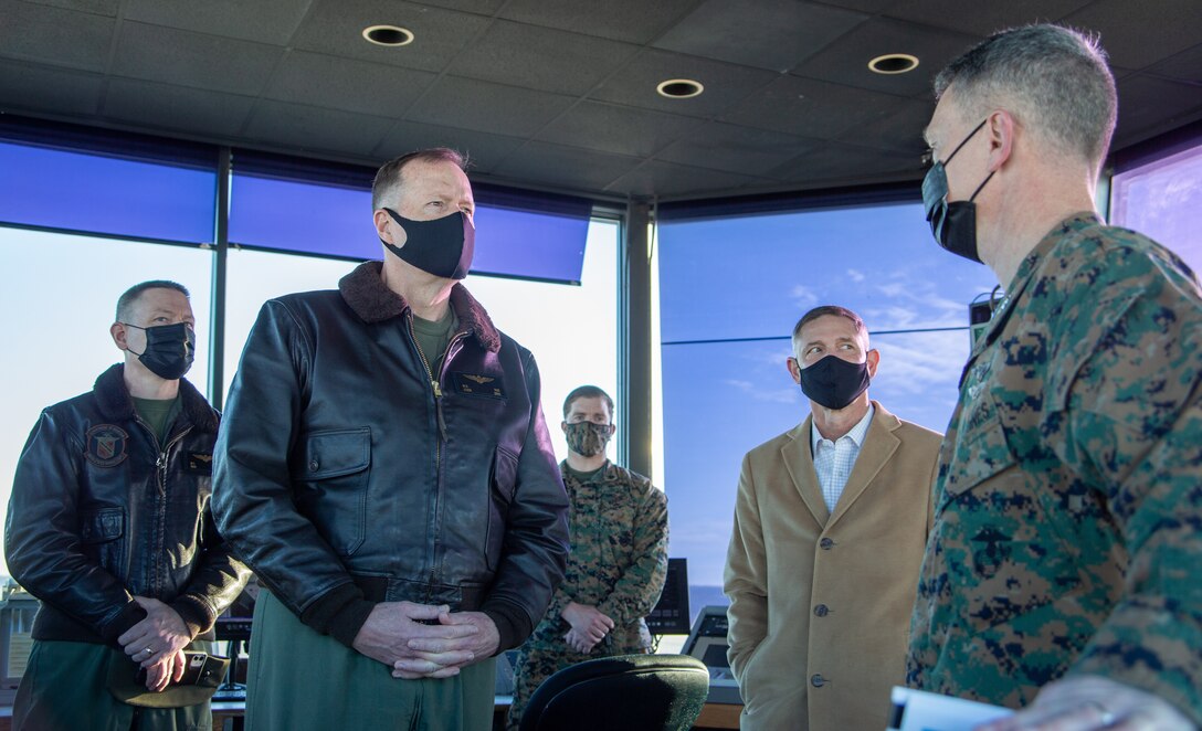 U.S. Marine Corps Lt. Gen. Mark Wise, deputy commandant for Aviation, listens to an overview briefing from Col. Mikel Huber, Marine Corps Air Station (MCAS) Cherry Point commanding officer, in the air traffic control tower during a visit to MCAS Cherry Point, North Carolina, Feb. 9, 2022. This visit gave Wise an in-depth look at the installation as it prepares for the F-35 Joint Strike Fighter program. (U.S. Marine Corps photo by Lance Cpl. Jacob Bertram)