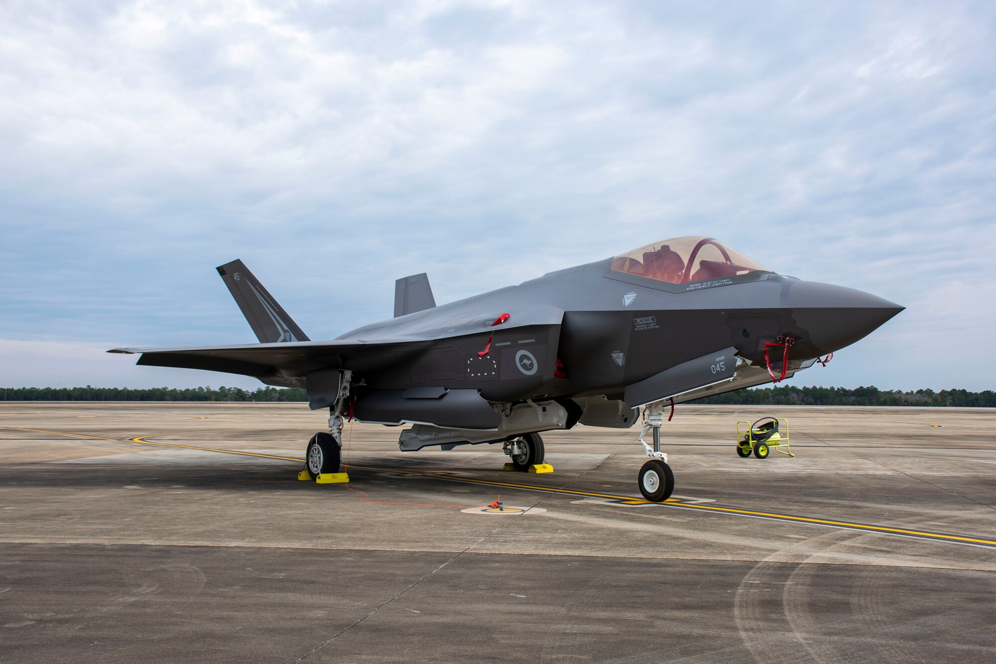 A Royal Australian Air Force F-35A Lightning II sits on the flightline between sorties during Exercise Lightning Spear, a live-fire missile event supported by the 53rd Wing, on Nov. 23, 2021, at Eglin Air Force Base, Fla. This is the second year that No 77 Squadron participated in EX LSP where they were evaluated on all aspects of logistics, maintenance, and operations in support of AIM-120D Advanced Medium Range Air-to-Air Missile combat capability for their F-35s. (U.S. Air Force photo by 1st Lt. Lindsey Heflin)