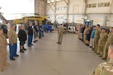 COL J Parker addresses CCAD artisans in the hangar.
