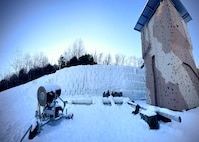 Students at the U.S. Army Mountain Warfare School’s Basic Military Mountaineer Course learn ice climbing techniques at the school’s ice climbing wall Jan. 21, 2022. The schoolhouse uses the same snow-making machine that commercial ski resorts use to keep the wall covered in ice.