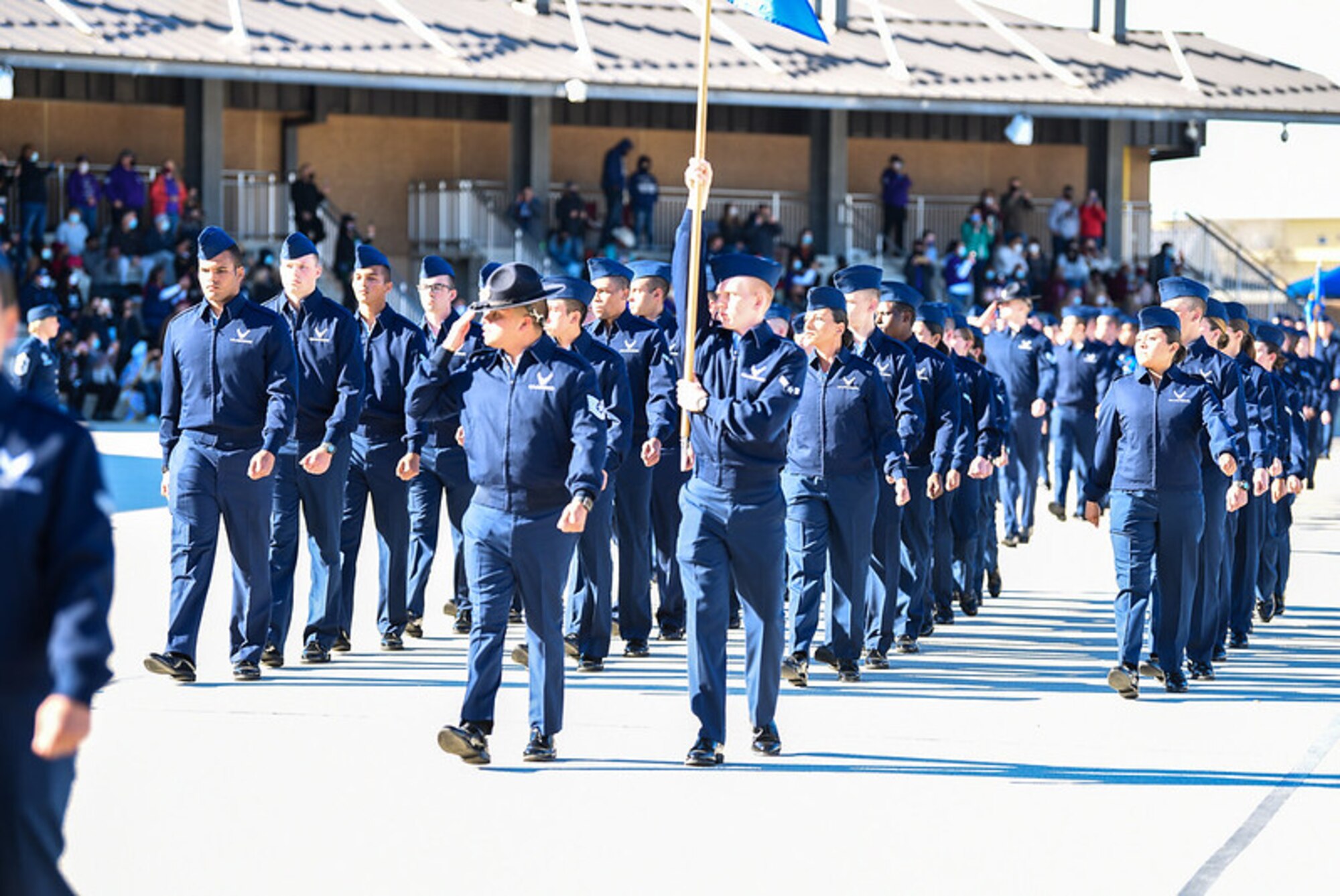 BMT trainees march during their graduation parade.