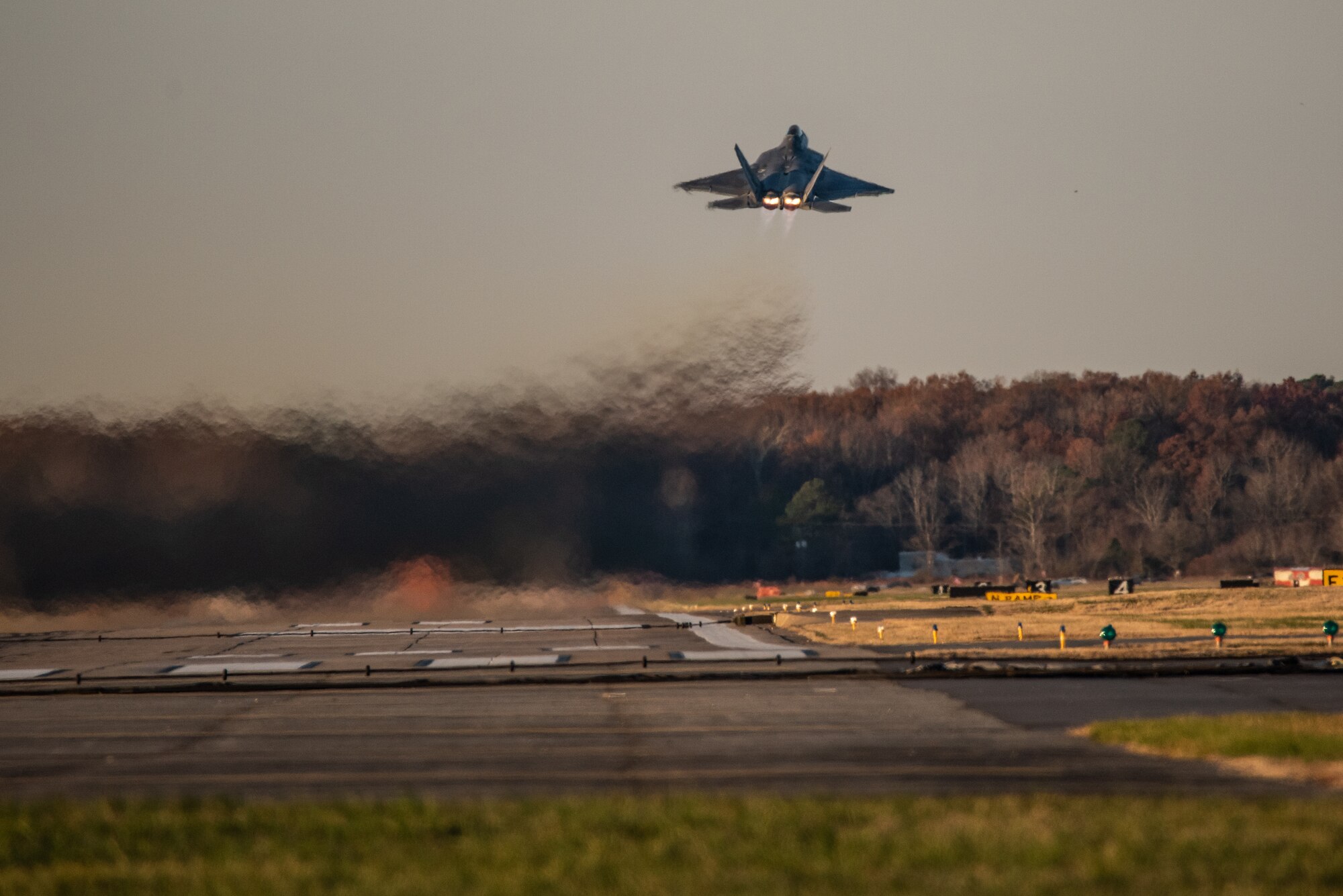 U.S. Air Force Maj. Josh Gunderson, F-22 Raptor Demonstration Team commander and pilot, takes off to perform a practice demo at Joint Base Langley-Eustis, Va., Jan. 22, 2020.
