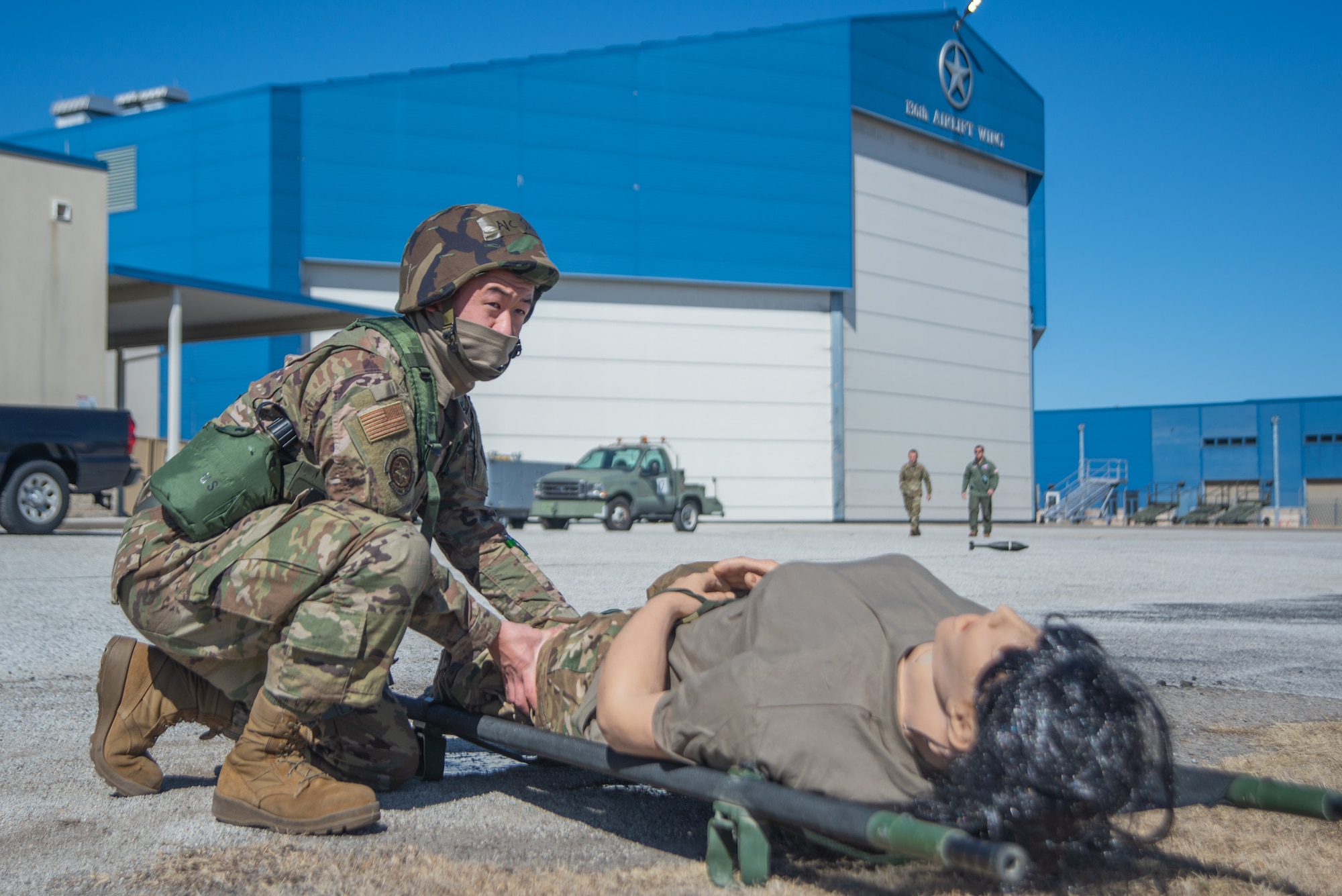 Airman checks on medical mannikin