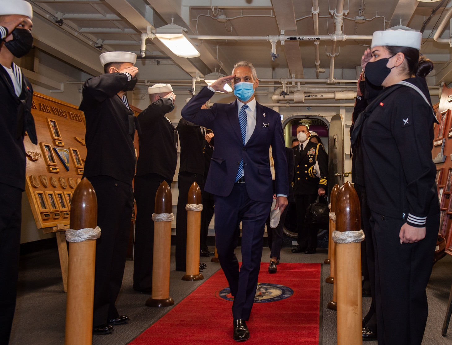 YOKOSUKA, Japan (Feb. 17, 2022) The Honorable Rahm Emanuel, the U.S. ambassador to Japan, walks through sideboys in the ceremonial quarterdeck of the U.S. Navy’s only forward-deployed aircraft carrier USS Ronald Reagan (CVN 76). During his visit, Emanuel toured Ronald Reagan, addressed the crew, and served as the keynote speaker in a naturalization ceremony where 17 candidates from 11 different countries became American citizens. Ronald Reagan, the flagship of Carrier Strike Group 5, provides a combat-ready force that protects and defends the United States, and supports alliances, partnerships and collective maritime interests in the Indo-Pacific region. (U.S. Navy photo by Mass Communication Specialist 3rd Class Daniel G. Providakes)