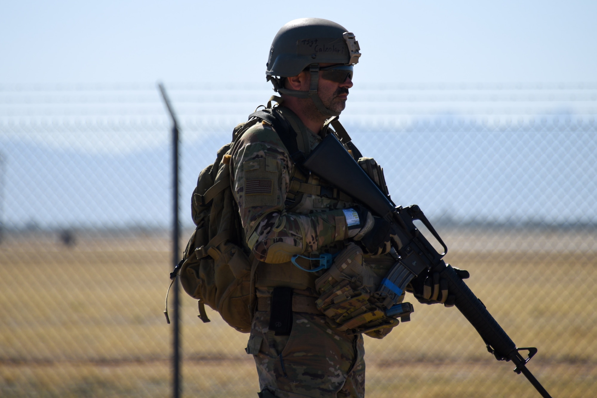 A photo of an Airman standing guard.