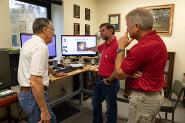 Receiving a patent in July 2021 for “Bedload transport methodology and method of use,” a Coastal and Hydraulics Laboratory (CHL) team at the Engineer Research and Development Center (ERDC) discuss their invention. It estimates sediment movement rates by measuring the bathymetric elevations in specific areas of a river multiple times. From left, CHL’s research hydraulic engineer David Abraha, research physicist Tate McAlpin and research physicist Thad Pratt invented these methods to answer river engineers’ challenges.