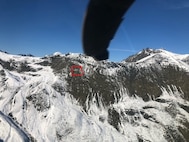 A sheep hunter suffering from minor cold weather injuries and malnourishment found himself stranded for two days at 5,750 feet on a three-by-three-foot ledge on a 50-degree slope near Cottonwood Creek in the Knik River Valley, Sept. 15, 2021. The Alaska Army National Guard’s Golf Company, Detachment 1, 2-211th General Aviation Support Battalion received his distress signal and rescued him in a hoist-capable HH-60M Black Hawk helicopter. For their efforts during the rescue, the crew members received the DUSTOFF Association 2021 Rescue of the Year award. DUSTOFF is a nonprofit organization for veterans and service members involved with Army aeromedical evacuation programs. (Courtesy photo)