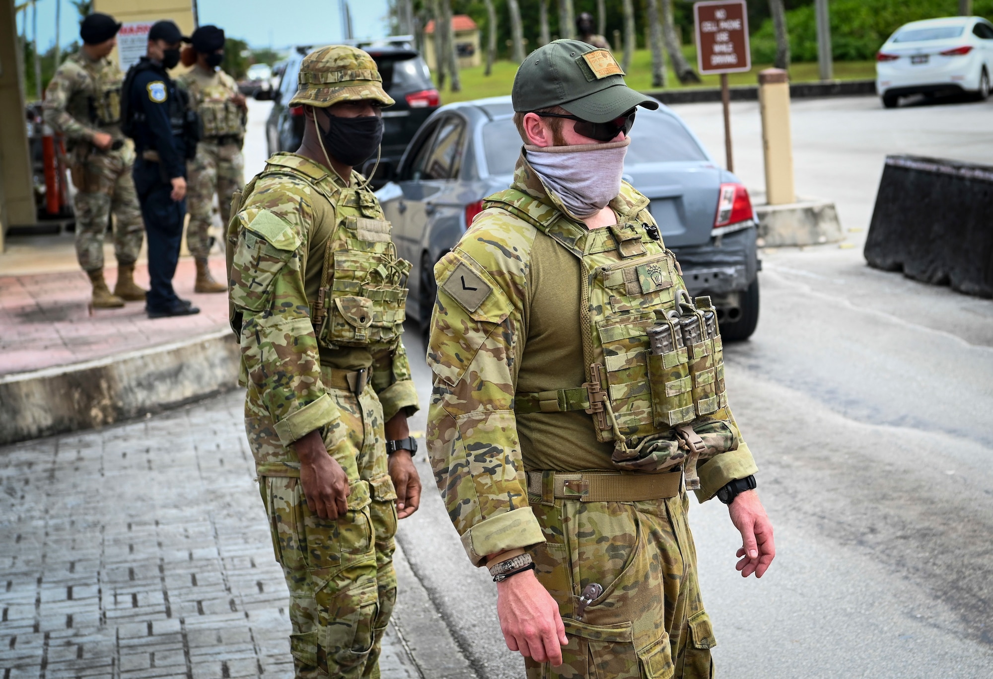 Royal Australian Air Force personnel conduct an identification card check at Arc Light Gate during Cope North 22 on Andersen Air Force Base, Guam, Feb. 15, 2022.