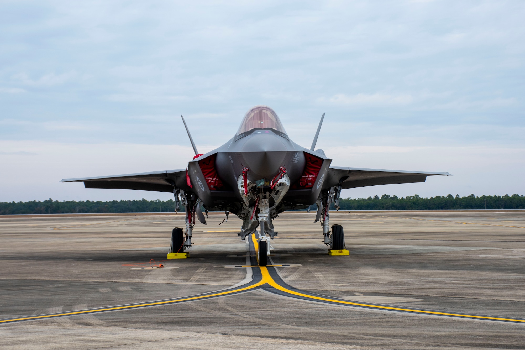 A Royal Australian Air Force F-35A Lightning II sits on the flightline between sorties during Exercise Lightning Spear, a live-fire missile event supported by the 53rd Wing, on Nov. 23, 2021, at Eglin Air Force Base, Fla. This is the second year that No 77 Squadron participated in EX LSP where they were evaluated on all aspects of logistics, maintenance, and operations in support of AIM-120D Advanced Medium Range Air-to-Air Missile combat capability for their F-35s. (U.S. Air Force photo by 1st Lt. Lindsey Heflin)