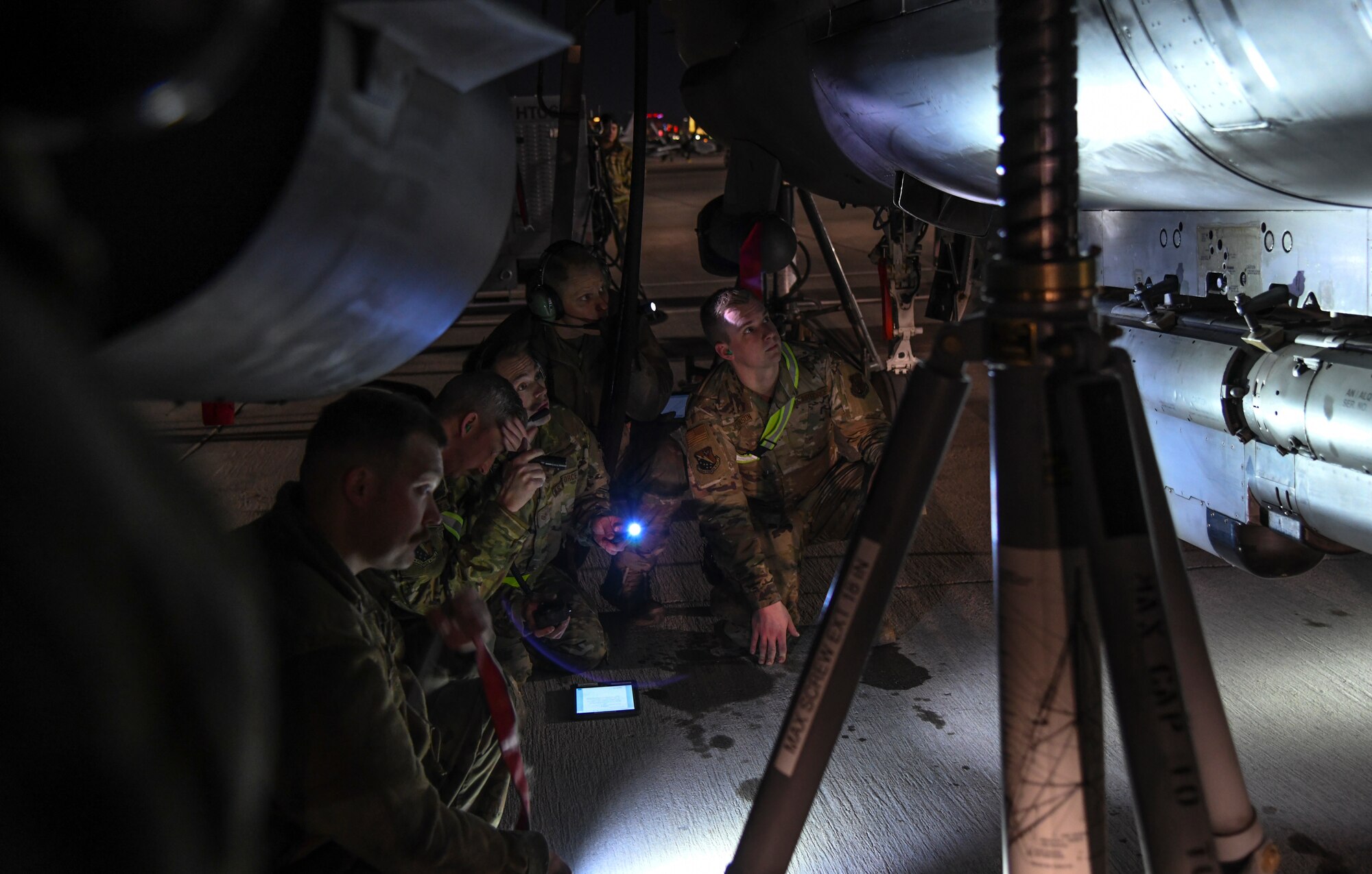 U.S. Air Force maintenance personnel, 148th Fighter Wing, Minnesota Air National Guard, Duluth, Minn., perform routine maintenance on the Block 50 F-16CM Fighting Falcon at Nellis Air Force Base, Nev., Feb 8, 2022, while participating in Red-Flag Nellis 22-1.