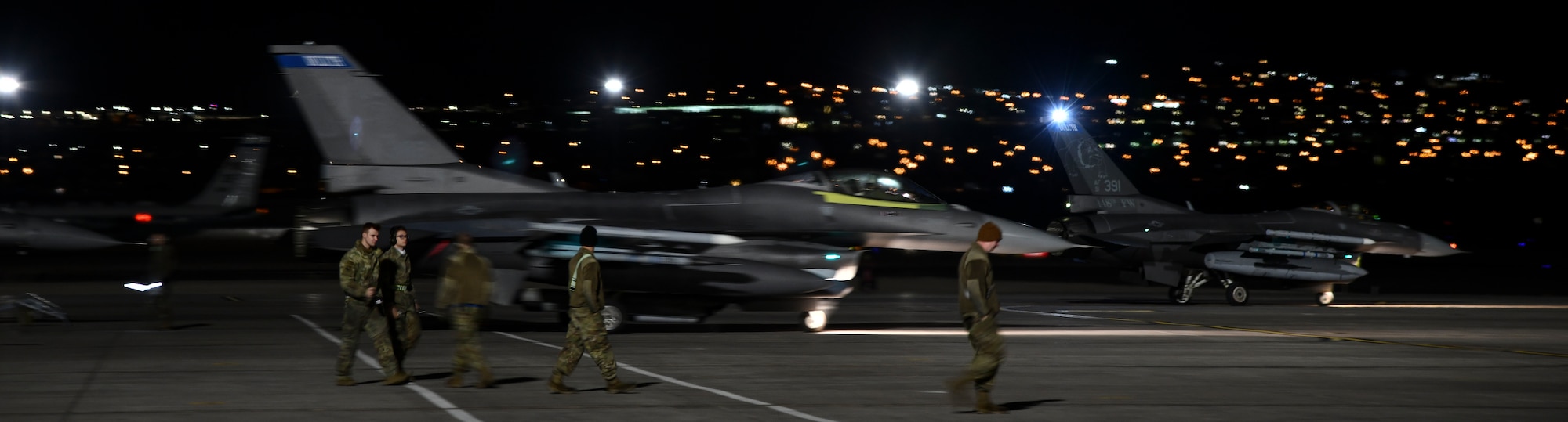 U.S. Air Force Crew Chiefs assigned to 148th Fighter Wing, Minnesota Air National Guard finish launching Block 50 F-16CM Fighting Falcons at Nellis Air Force Base, Nev., Feb 8, 2022, while participating in Red-Flag Nellis 22-1.