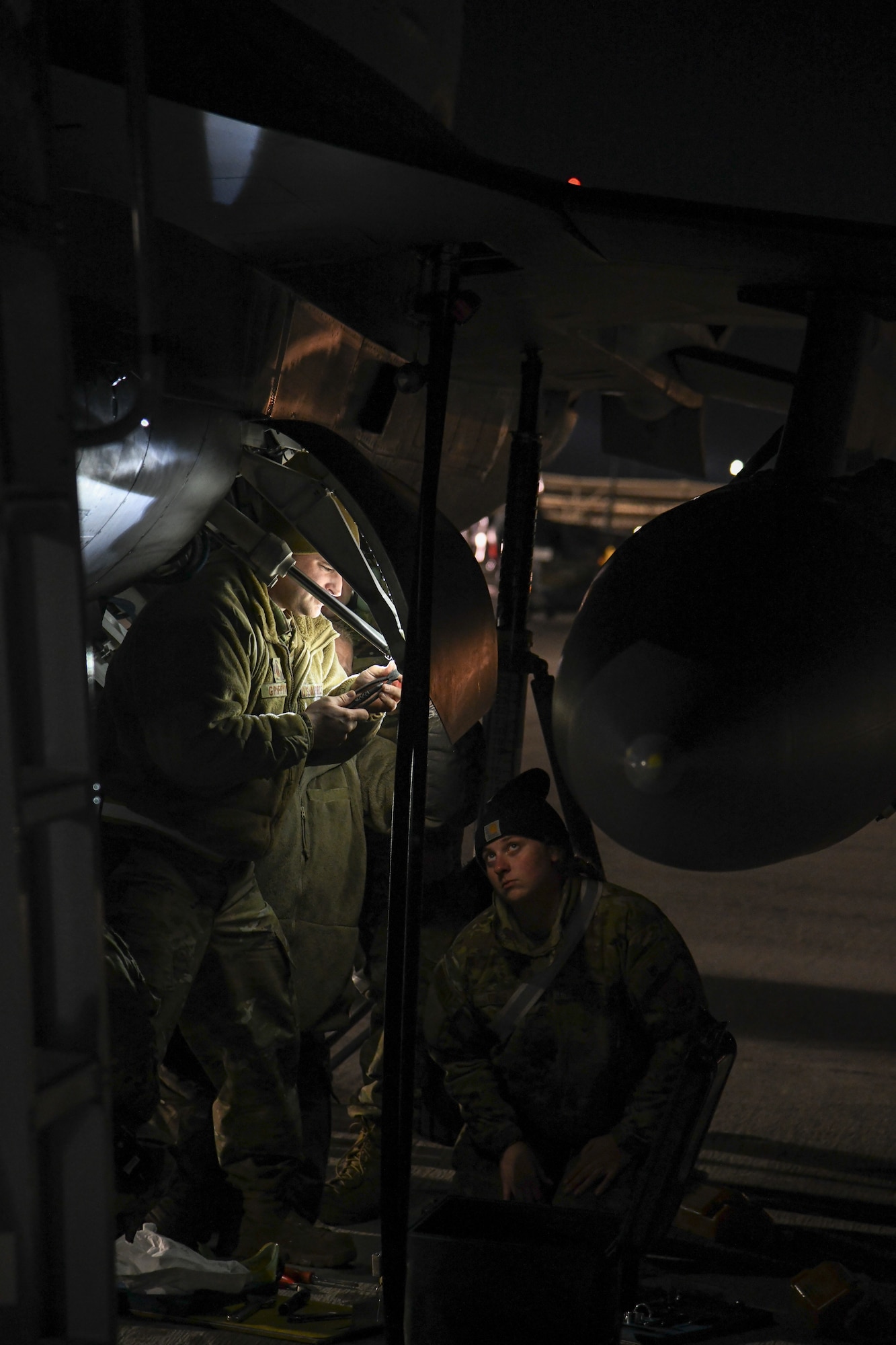 U.S. Air Force F-16 Crew Chiefs assigned to the 148th Fighter Wing, Minnesota Air National Guard, Duluth, Minn., perform maintenance on a Block 50 F-16CM Fighting Falcon during a training exercise at Nellis Air Force Base, Nev., Feb 8, 2022, while participation in Red Flag Nellis 22-1.