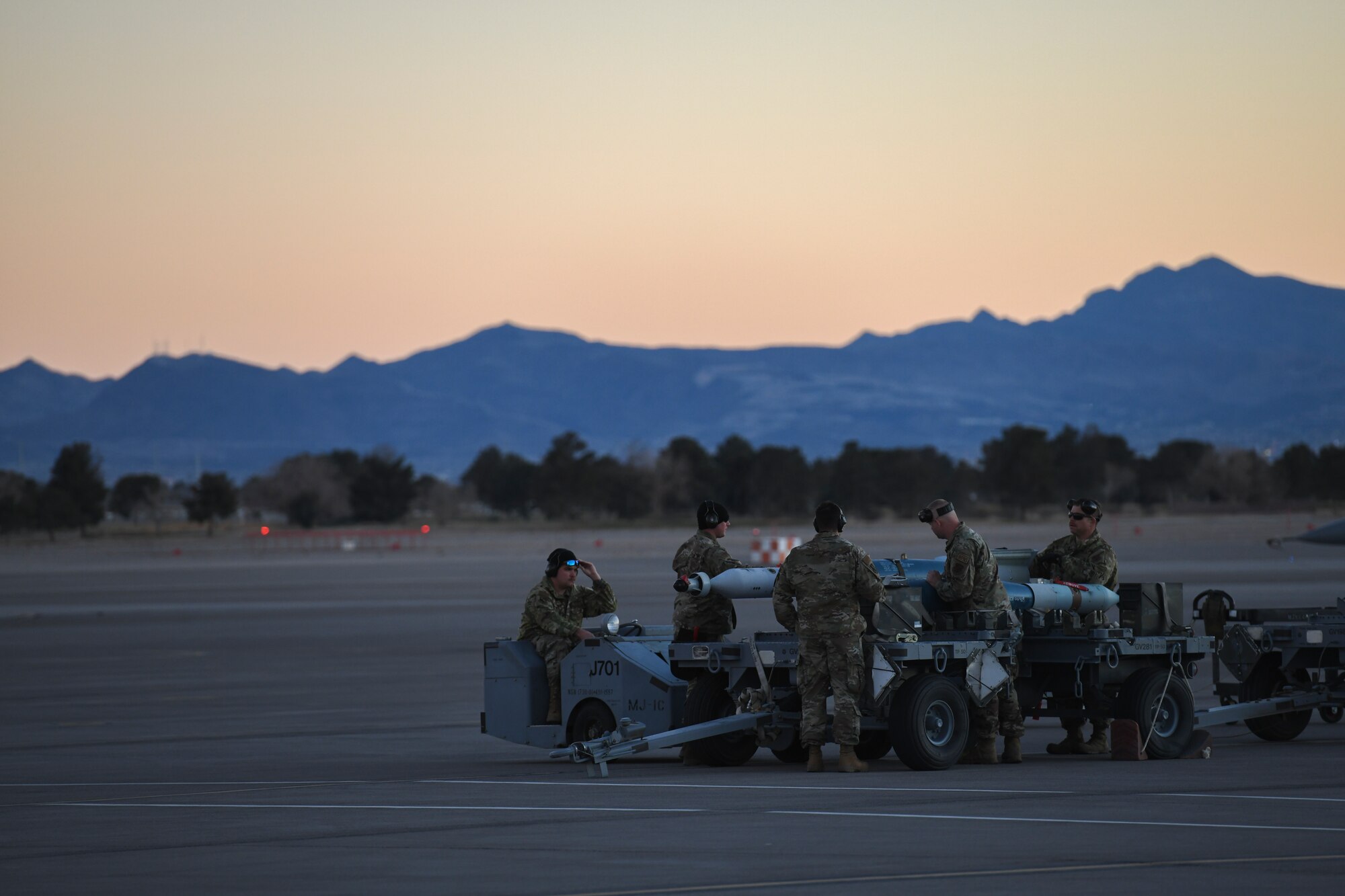 U.S. Air Force Aircraft Armament System Specialists assigned to the 148th Fighter Wing, Minnesota Air National Guard, Duluth, Minn., perform duties on the flight line after the unit’s Block 50 F-16CM Fighting Falcons returned from a training mission at Nellis Air Force Base, Nev., Feb 8, 2022, while participating in Red Flag 22-1.