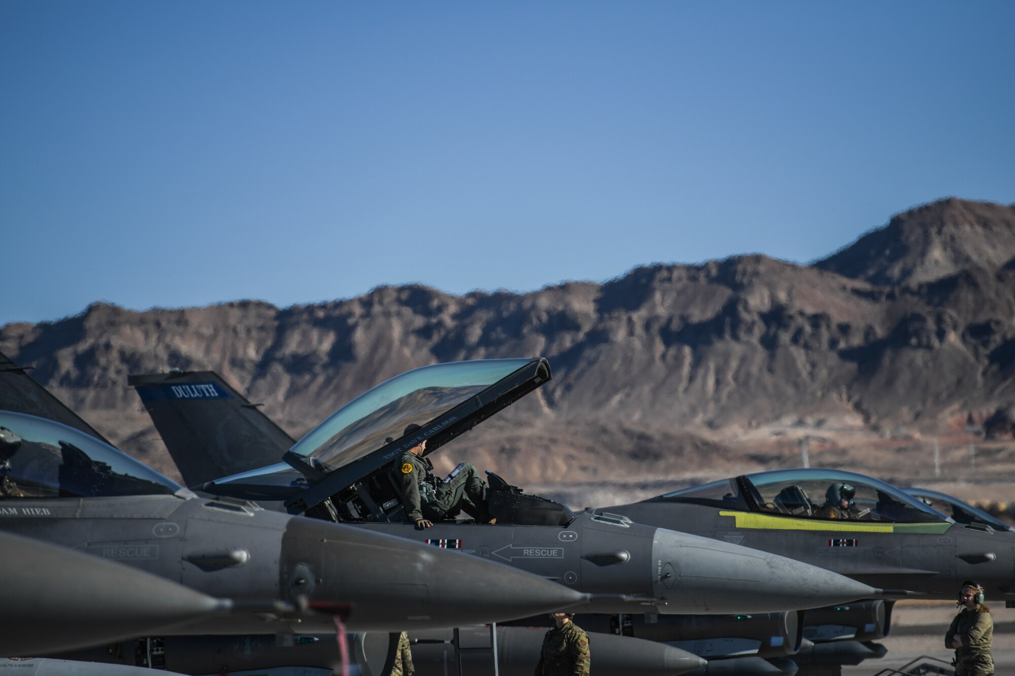 U.S. Air Force pilots assigned to the 148th Fighter Wing, Minnesota Air National Guard, Duluth, Minn., prepare for flight in a Block 50 F-16CM Fighting Falcon, Nellis Air Force Base, Nev., Feb 8, 2022, while participating in Red Flag 22-1.