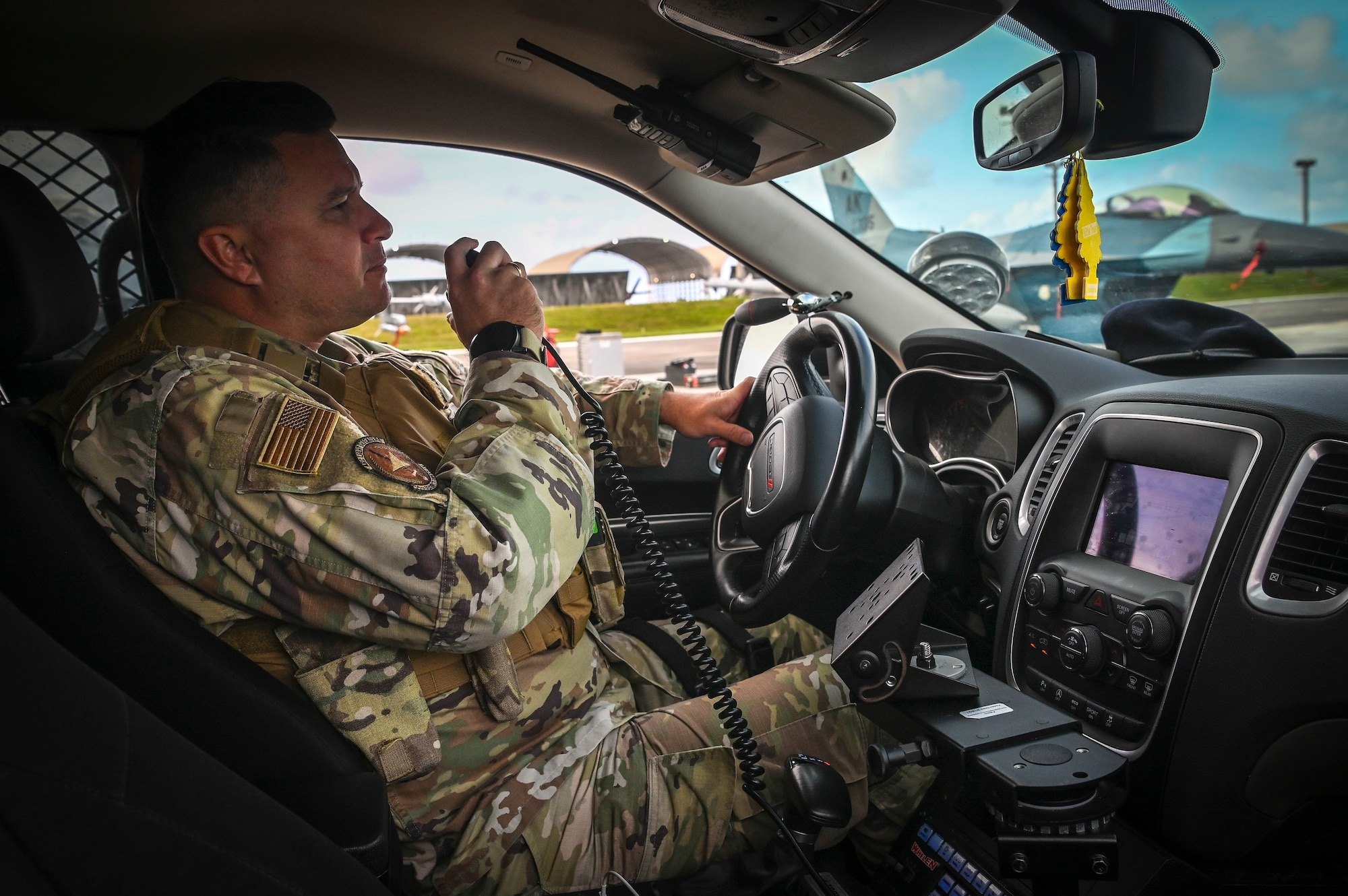 U.S. Air Force Tech. Sgt. Matthew Napatui, assigned to the 254th Security Forces Squadron, provides flight line security during exercise Cope North 22 on Andersen Air Base, Guam, Feb. 14, 2022.