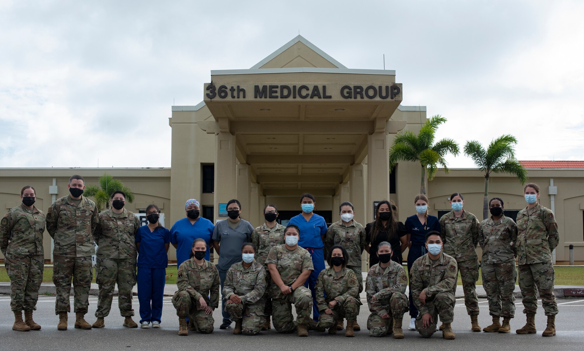 Service members assigned to the COVID-19 Testing Center, 36th Medical Group, pose for a photo at Andersen Air Force Base, Guam, Feb. 17, 2022.