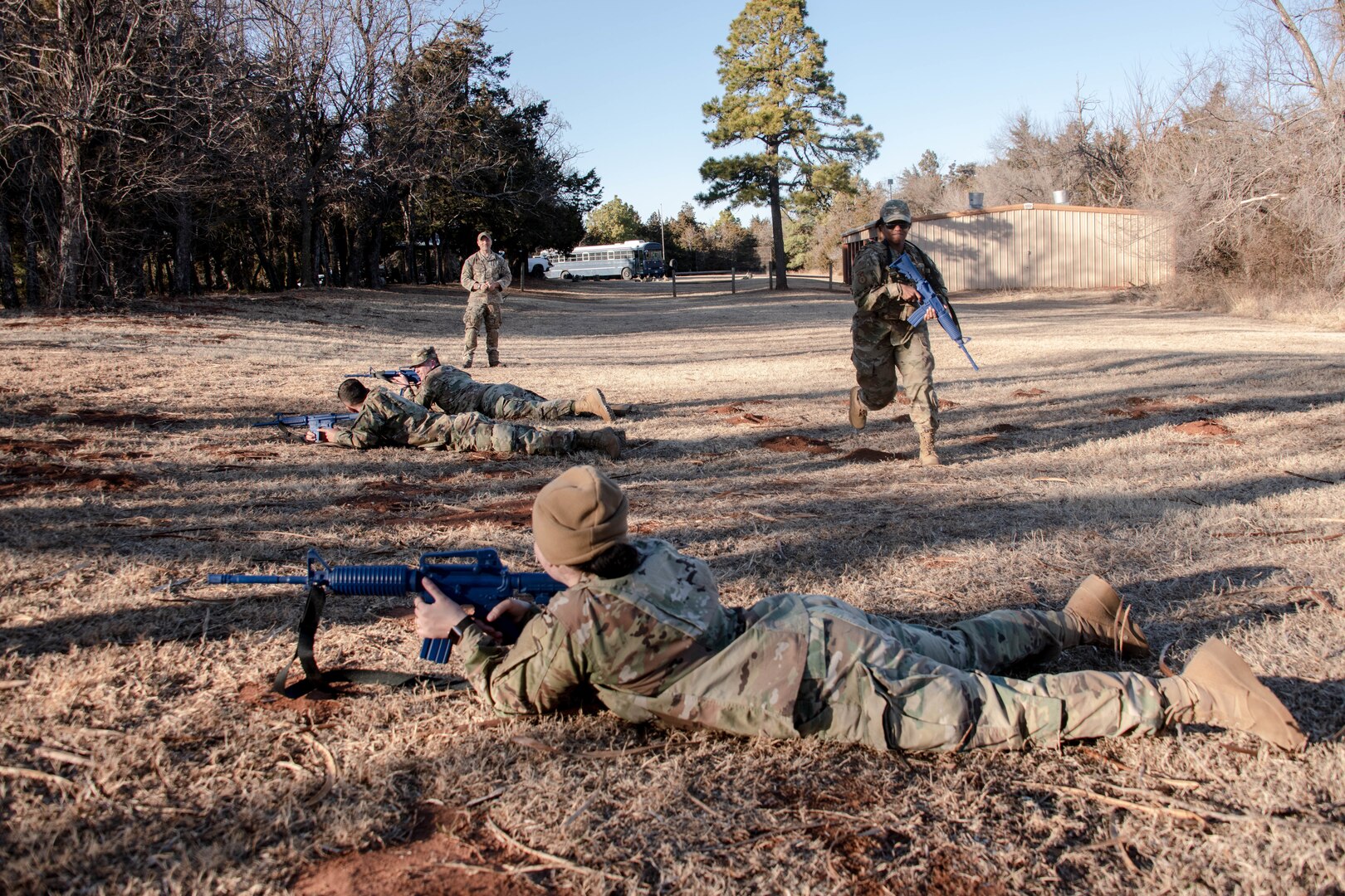 airmen defend in fire team formation