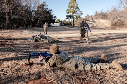 airmen defend in fire team formation
