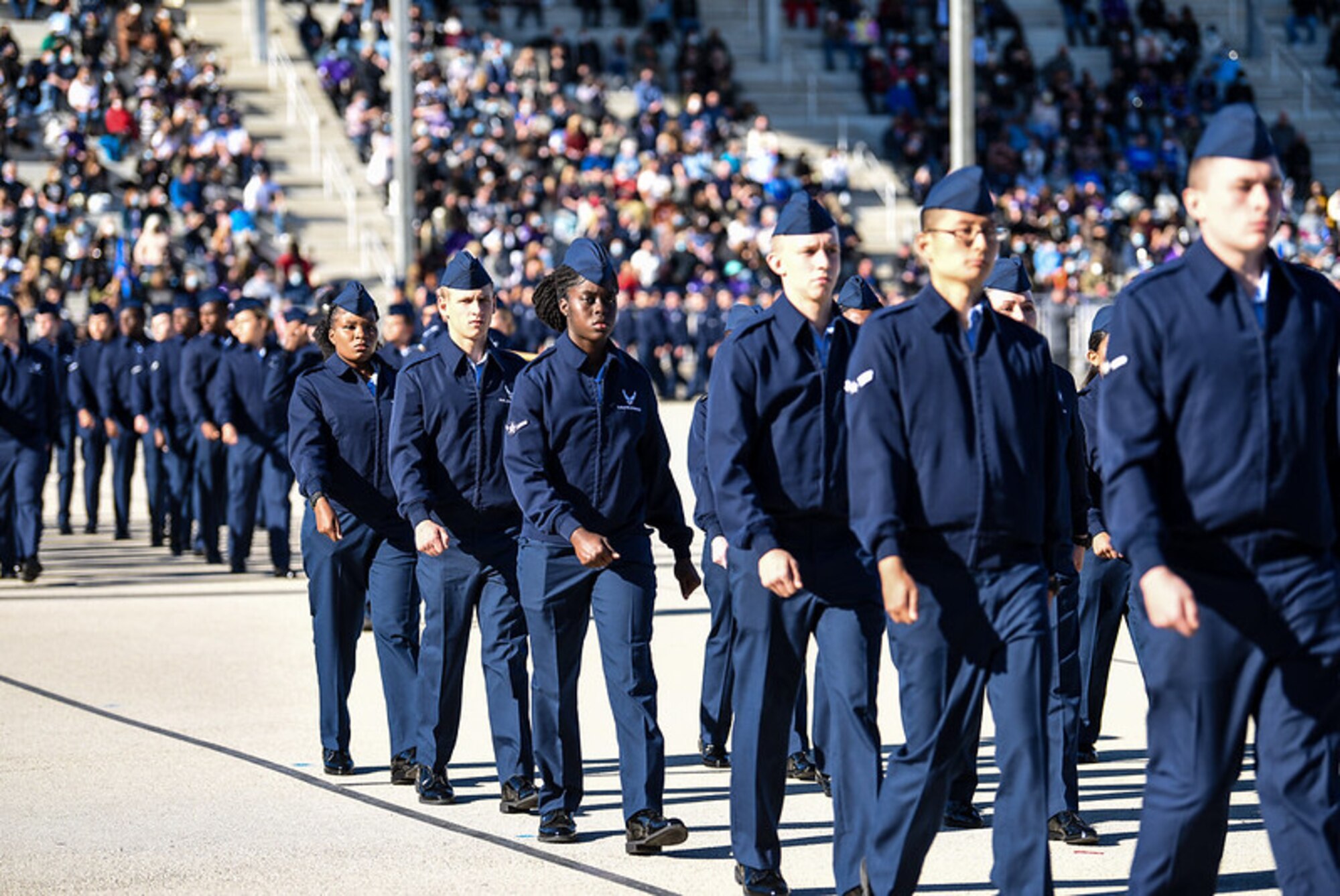 BMT trainees march during their graduation parade.