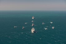220209-N-CR519-1889 ARABIAN GULF (Feb. 9, 2022) Mine countermeasures ships from partner nations participate in a photo exercise during International Maritime Exercise/Cutlass Express (IMX/CE) 2022 in the Arabian Gulf, Feb. 9. IMX/Cutlass Express 2022 is the largest multinational training event in the Middle East, involving more than 60 nations and international organizations committed to enhancing partnerships and interoperability to strengthen maritime security and stability. (U.S. Navy photo by Mass Communication Specialist 2nd Class Helen Brown)