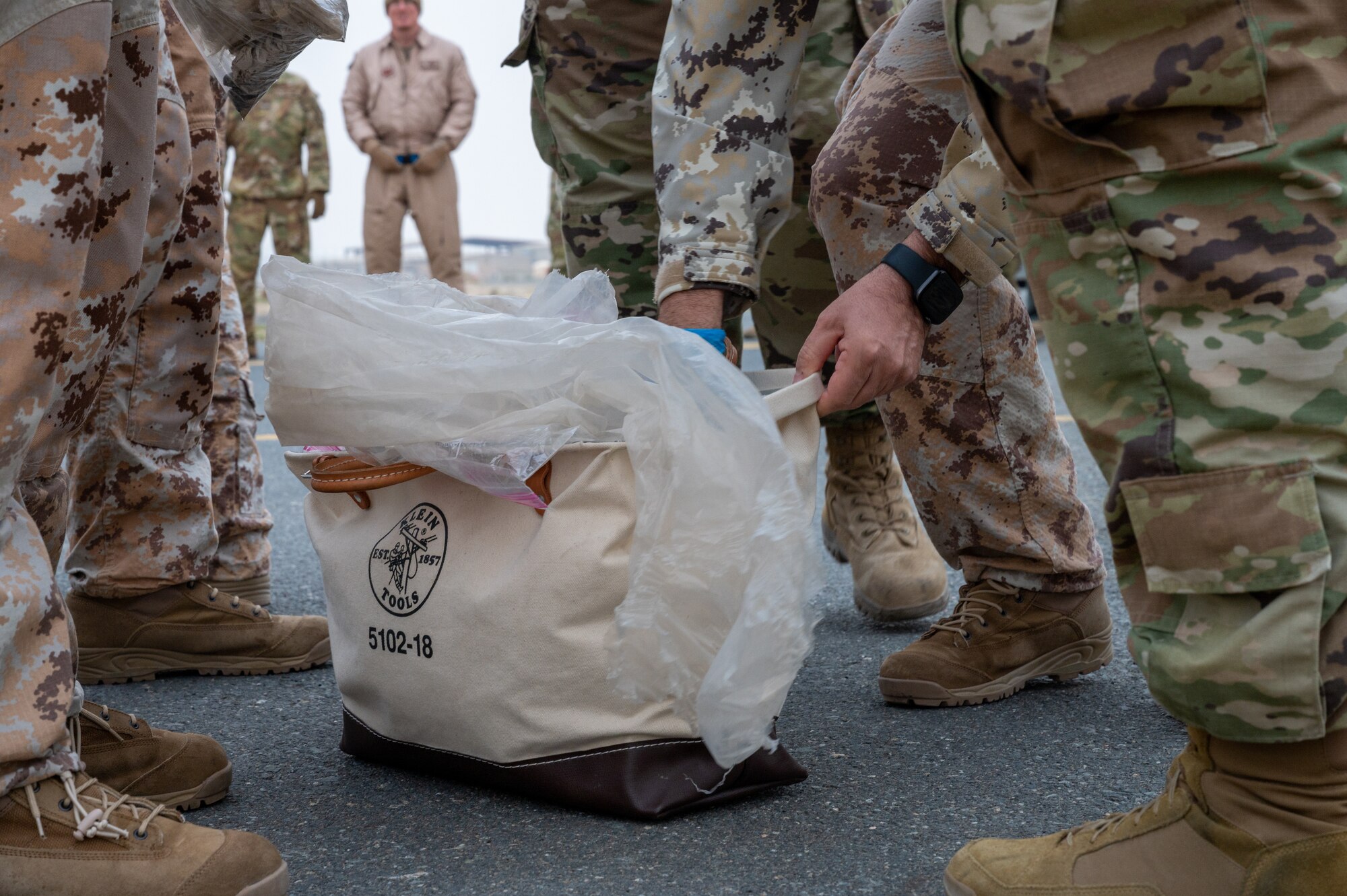 Airmen from the 386th Expeditionary Maintenance Group, including some from the 407th Expeditionary Operations Support Squadron, conduct FOD walks weekly.