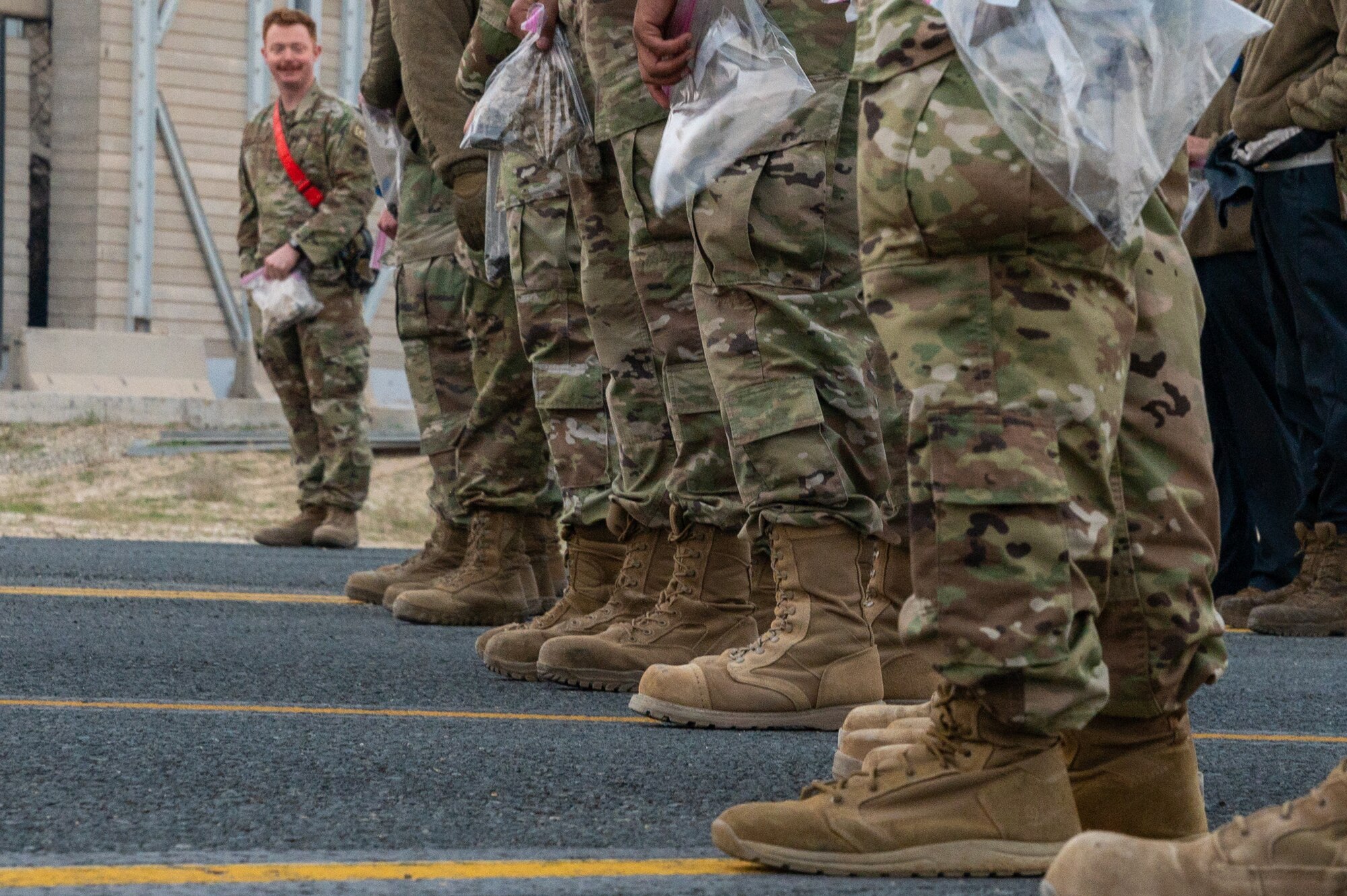 Airmen from the 386th Expeditionary Maintenance Group, including some from the 407th Expeditionary Operations Support Squadron, conduct FOD walks weekly.