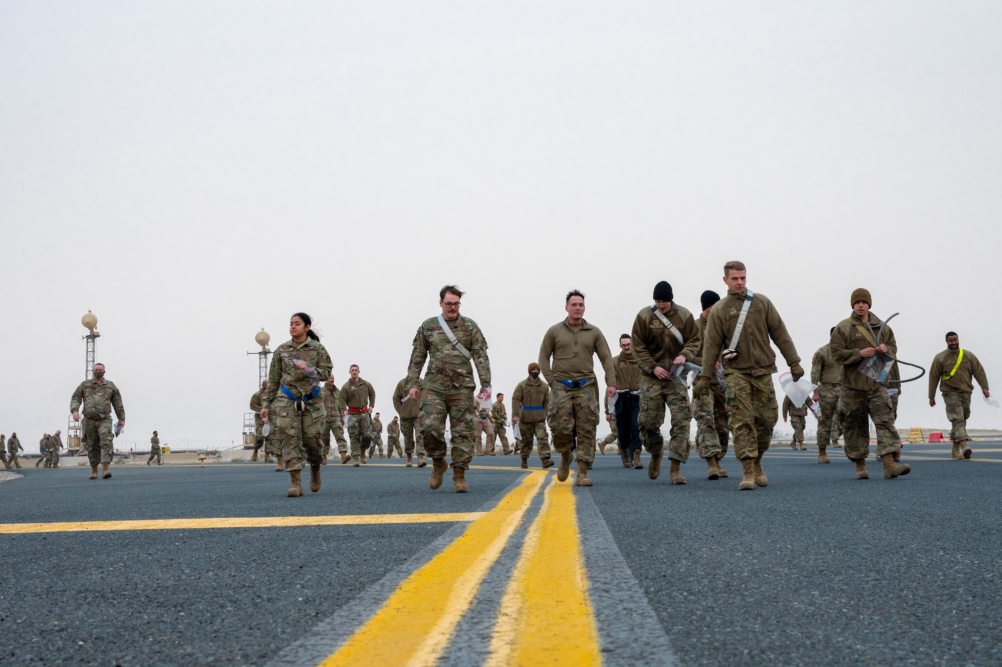 Airmen from the 386th Expeditionary Maintenance Group, including some from the 407th Expeditionary Operations Support Squadron, conduct FOD walks weekly.