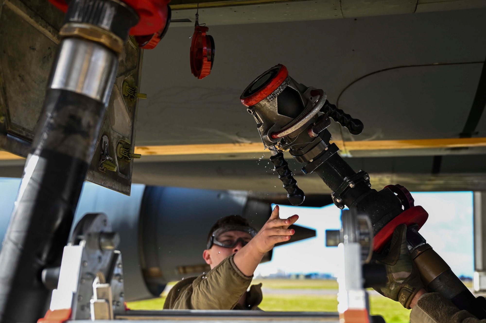 U.S. Air Force Airmen assigned to the 100th Logistics Readiness Squadron monitor fuel pressure in an R-11 fuel truck at Royal Air Force Mildenhall, England, Feb. 17, 2022.  Fuel pressure critically affects fuel flow, from truck to aircraft. (U.S. Air Force photo by Airman 1st Class Viviam Chiu)