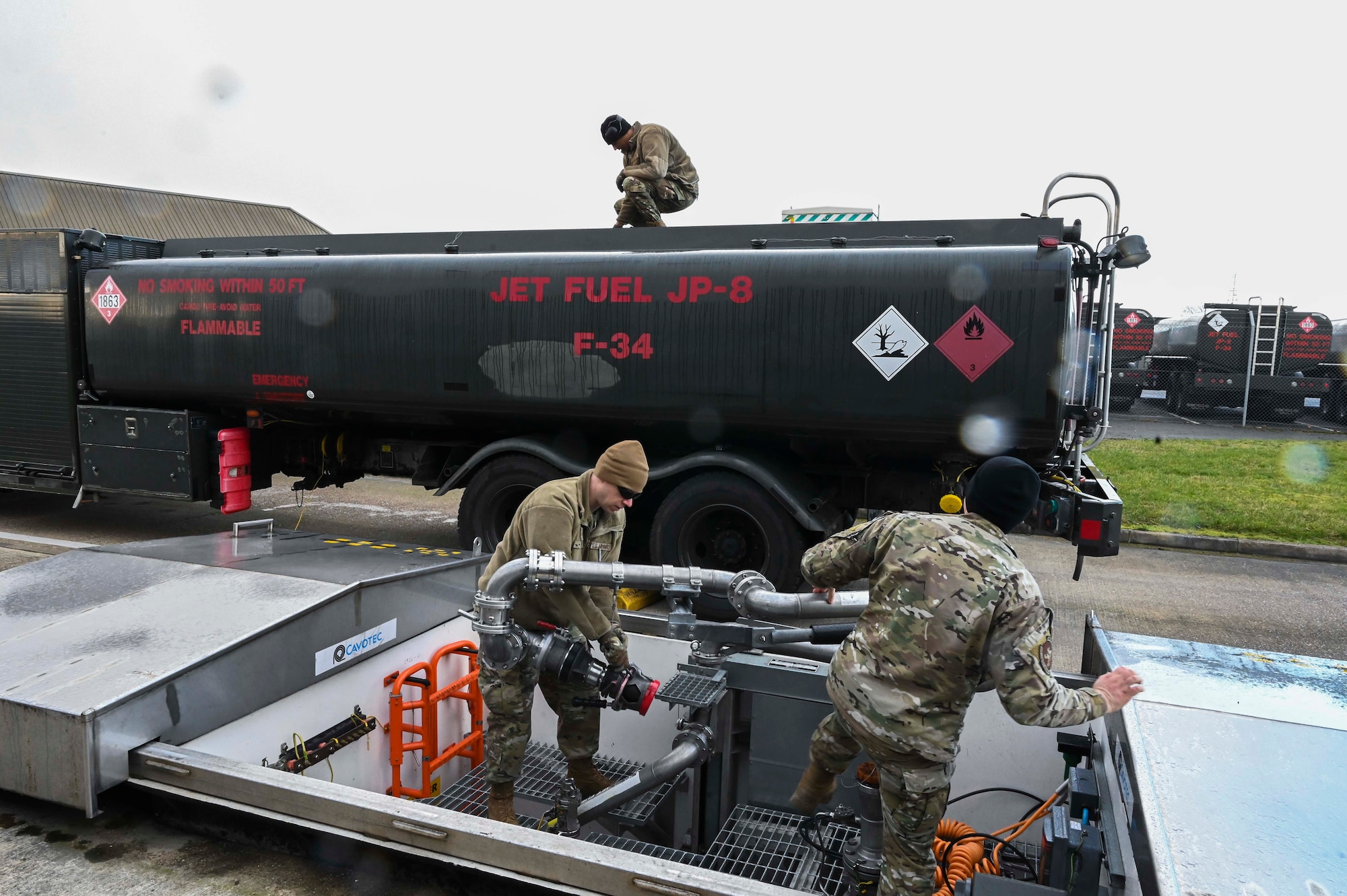 U.S. Air Force Airmen assigned to the 100th Logistics Readiness Squadron monitor fuel pressure in an R-11 fuel truck at Royal Air Force Mildenhall, England, Feb. 17, 2022.  Fuel pressure critically affects fuel flow, from truck to aircraft. (U.S. Air Force photo by Airman 1st Class Viviam Chiu)