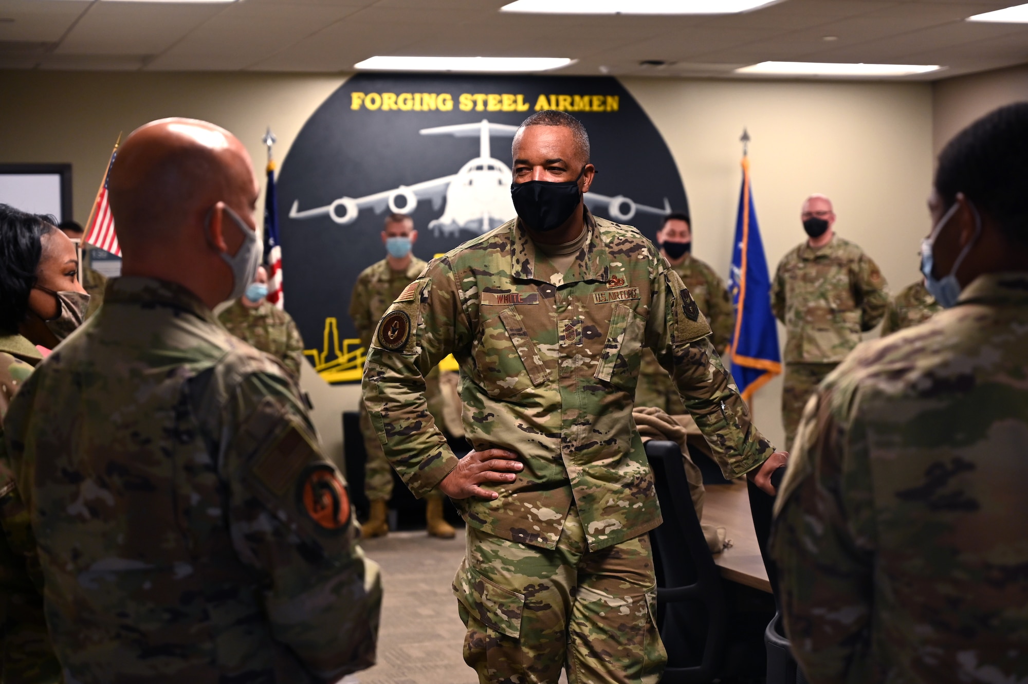 Chief Master Sgt. Timothy C. White, the Air Force Reserve Command Chief, speaks with Airmen assigned to the 911th Logistics Readiness Squadron at the Pittsburgh International Airport Air Reserve Station, Pennsylvania, Jan. 8, 2022.