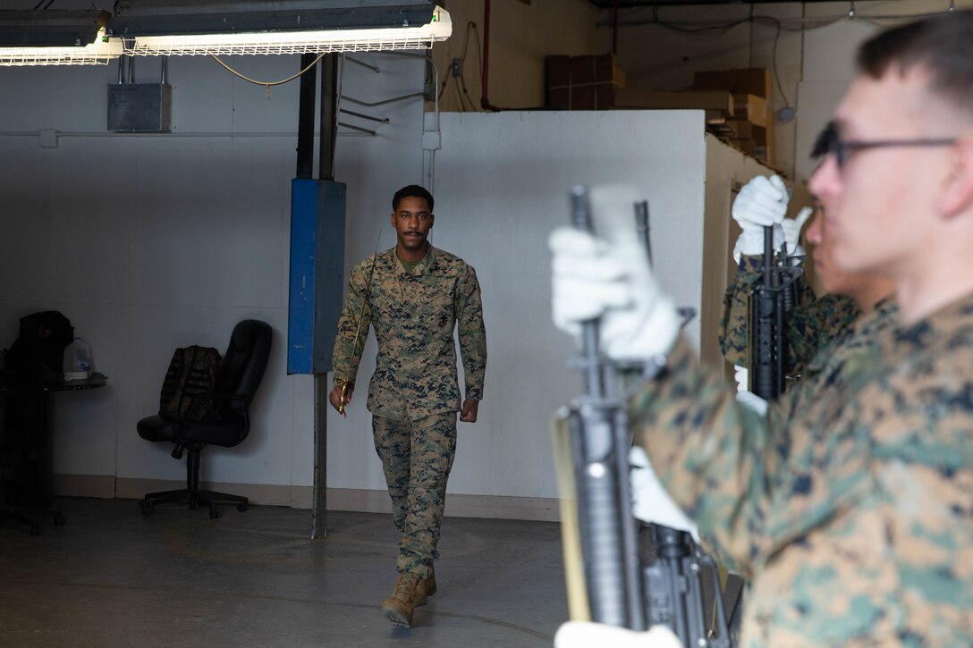 U.S Marine Corps Cpl. Dimerie Williams, a motor vehicle operator, practices the rifle line with the ceremonial platoon at Marine Corps Base Quantico, Va., Jan. 27. The Ceremonial platoon plans, coordinates, and provides color guard details for on and off ceremonies and conducting funeral details. (U.S. Marine Corps photo by Lance Cpl. Jennifer Sanchez)