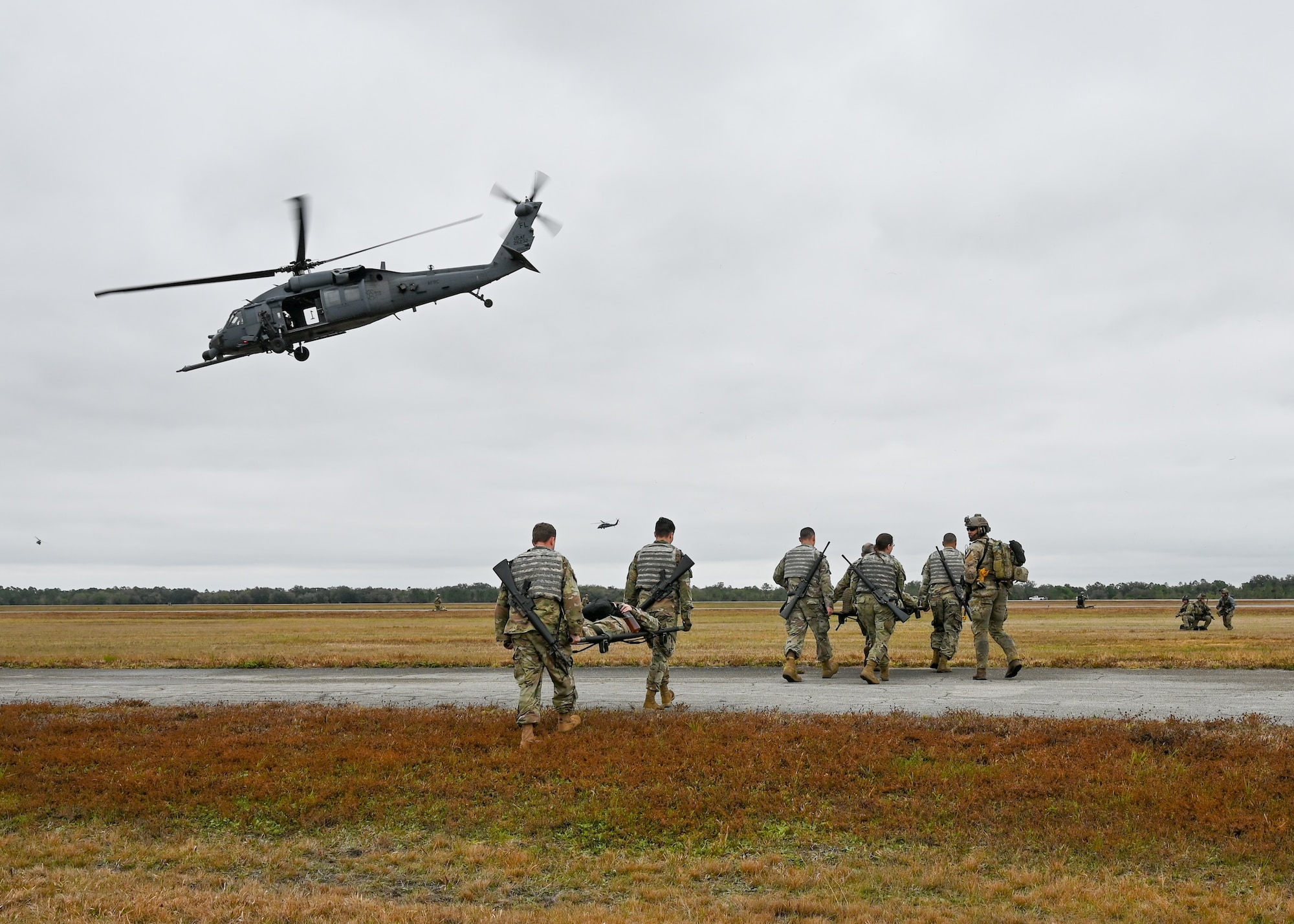 Airmen from the 920th Rescue Wing transport Airmen portraying combat injuries during the wing’s FURY HORIZON 22 exercise Feb. 5, 2022. The HORIZON series of wing exercises are held throughout the year at group and wing levels. They bring together the combined knowledge of the entire wing to focus tactics on executing their mission anywhere in the world at a moment’s notice. (U.S. Air Force photo by Capt. Amanda Ling)