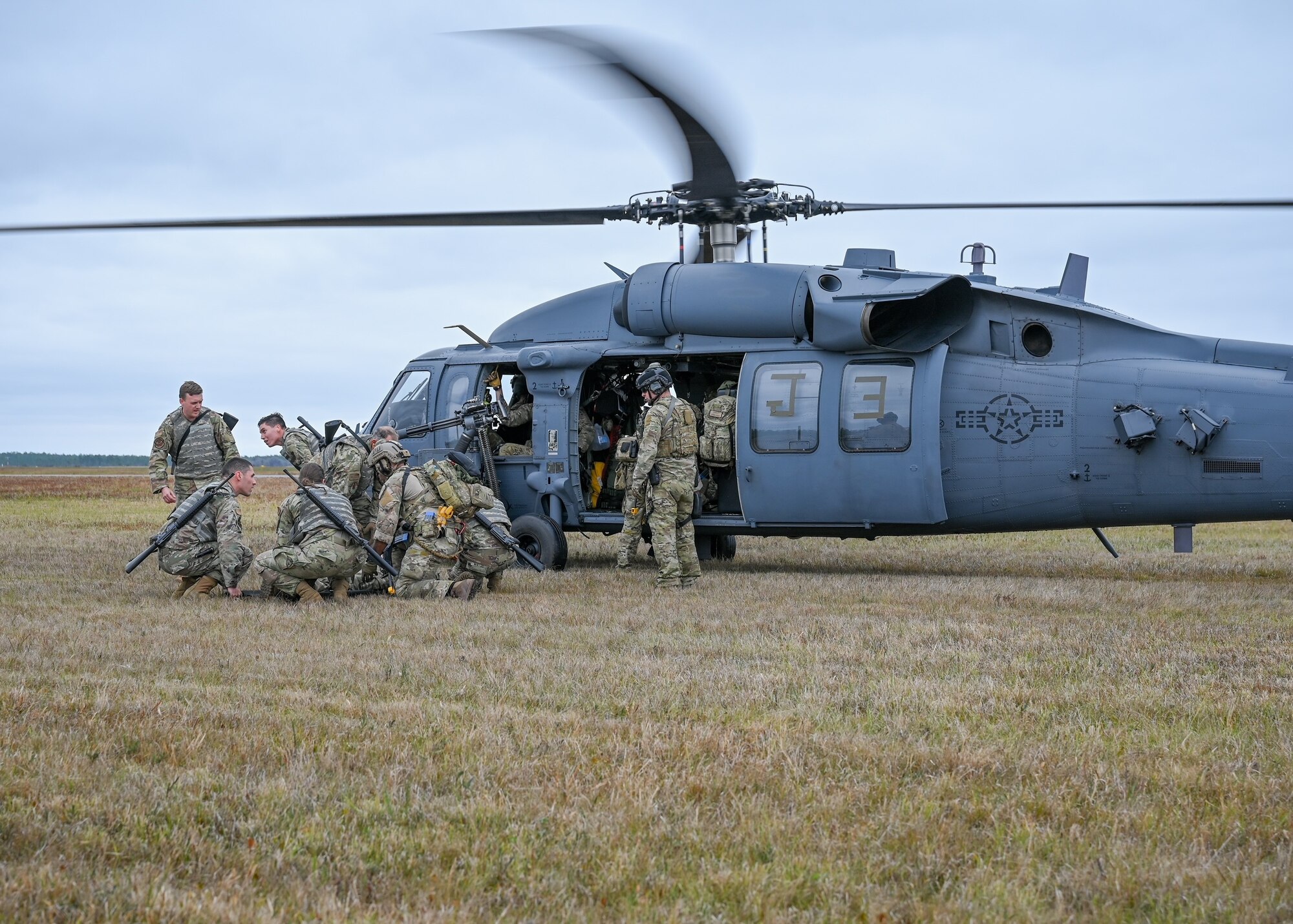 Airmen from the 920th Rescue Wing prepare to move a litter onto an HH-60 Pave Hawk helicopter during the wing’s FURY HORIZON 22 exercise Feb. 5, 2022. The HORIZON series of wing exercises are held throughout the year at group and wing levels. They bring together the combined knowledge of the entire wing to focus tactics on executing their mission anywhere in the world at a moment’s notice. (U.S. Air Force photo by Capt. Amanda Ling)