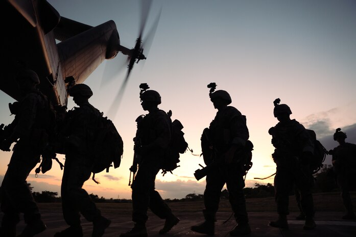 U.S. Marines with 2nd Battalion, 7th Marines, load a CH-53E Super Stallion during Jungle Warfare Exercise 22 on Camp Schwab, Okinawa, Japan, Feb. 15th, 2022. JWX 22 is a large-scale field training exercise focused on leveraging the integrated capabilities of joint and allied partners to strengthen all-domain awareness, maneuver, and fires across a distributed maritime environment. 2/7 is forward-deployed in the Indo-Pacific under 4th Marines, 3d Marine Division as a part of the Unit Deployment Program.